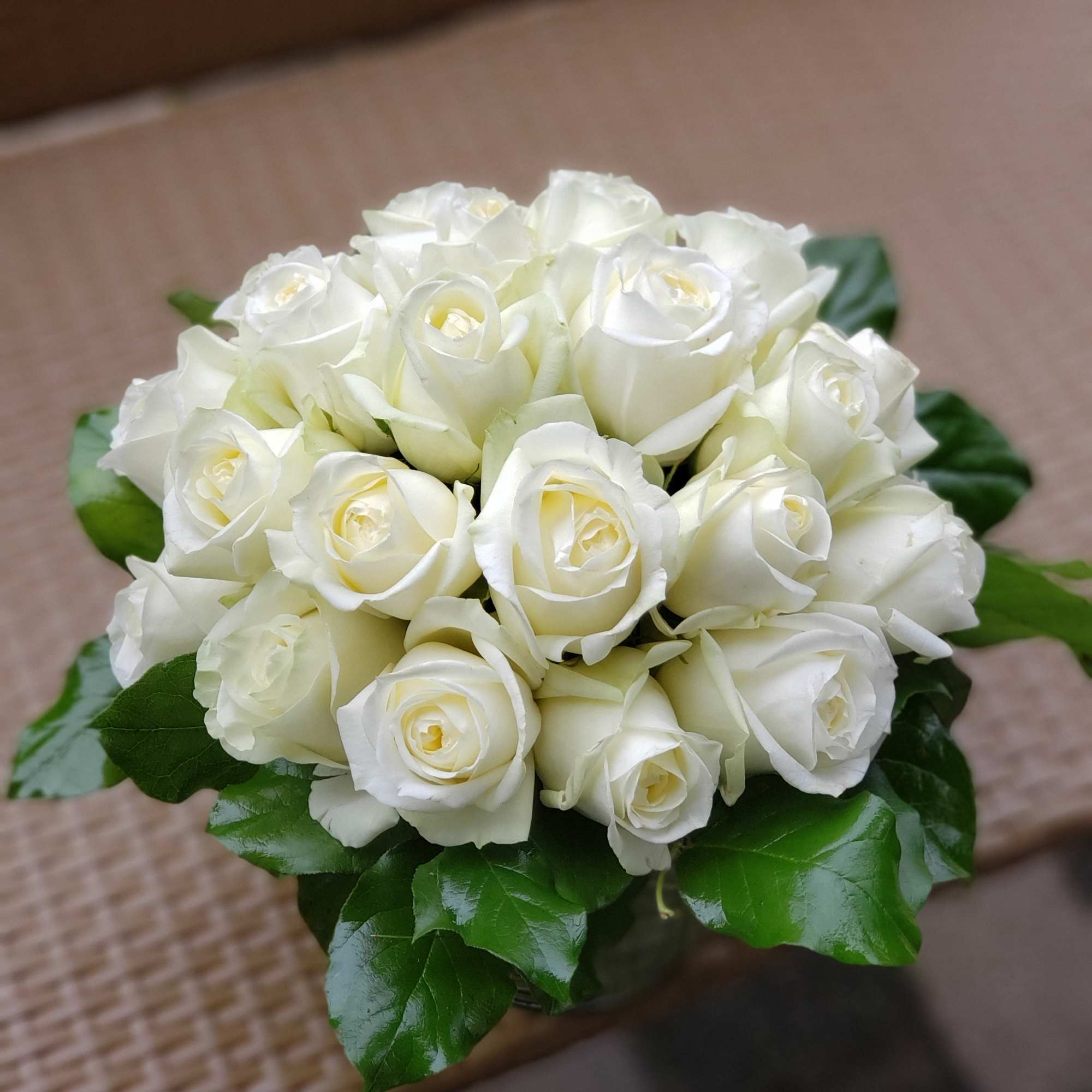 Make a bold statement with this elegantly simple design. White roses symbolize Make a bold statement with this elegantly simple design. White roses symbolize