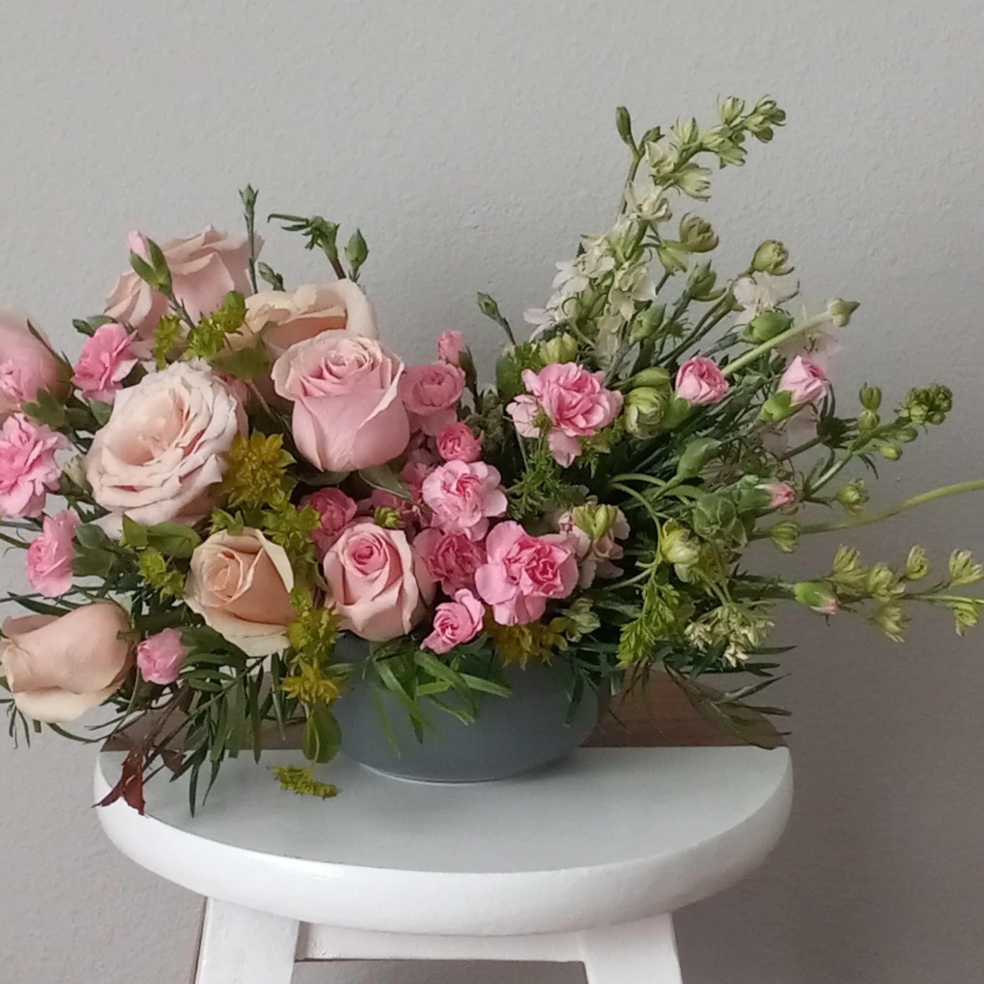 Think pink!  Rosy Iridescence Bouquet features beautiful pink roses, pink mini