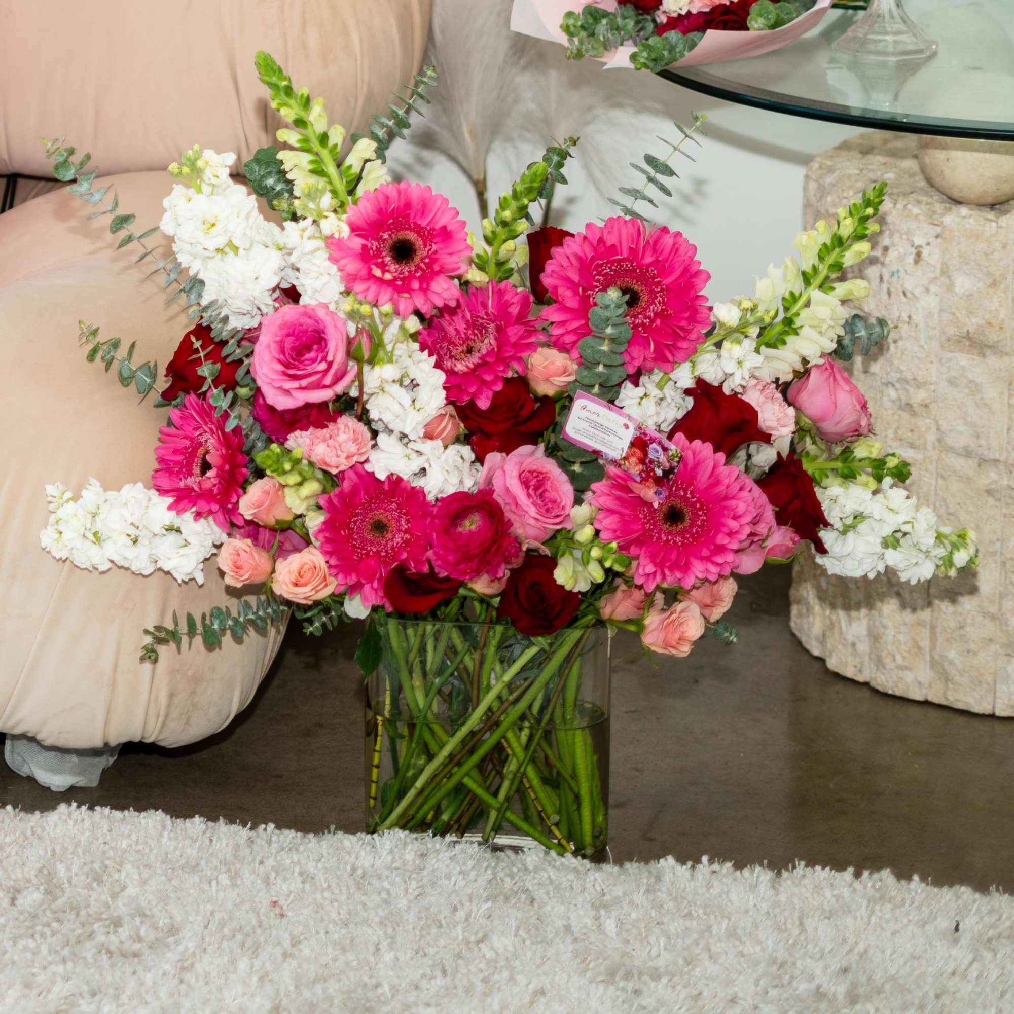 Introducing our exquisite LOVE ME Arrangement, a playful blend of elegance and