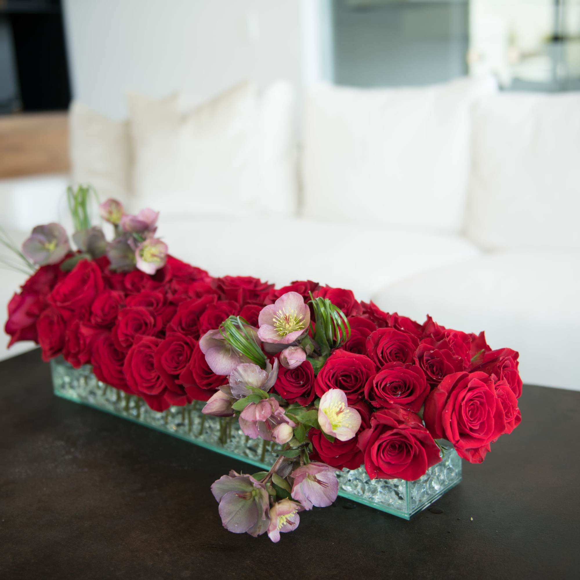Luxury statement piece made using 6 Dozen Scarlet Red roses with an
