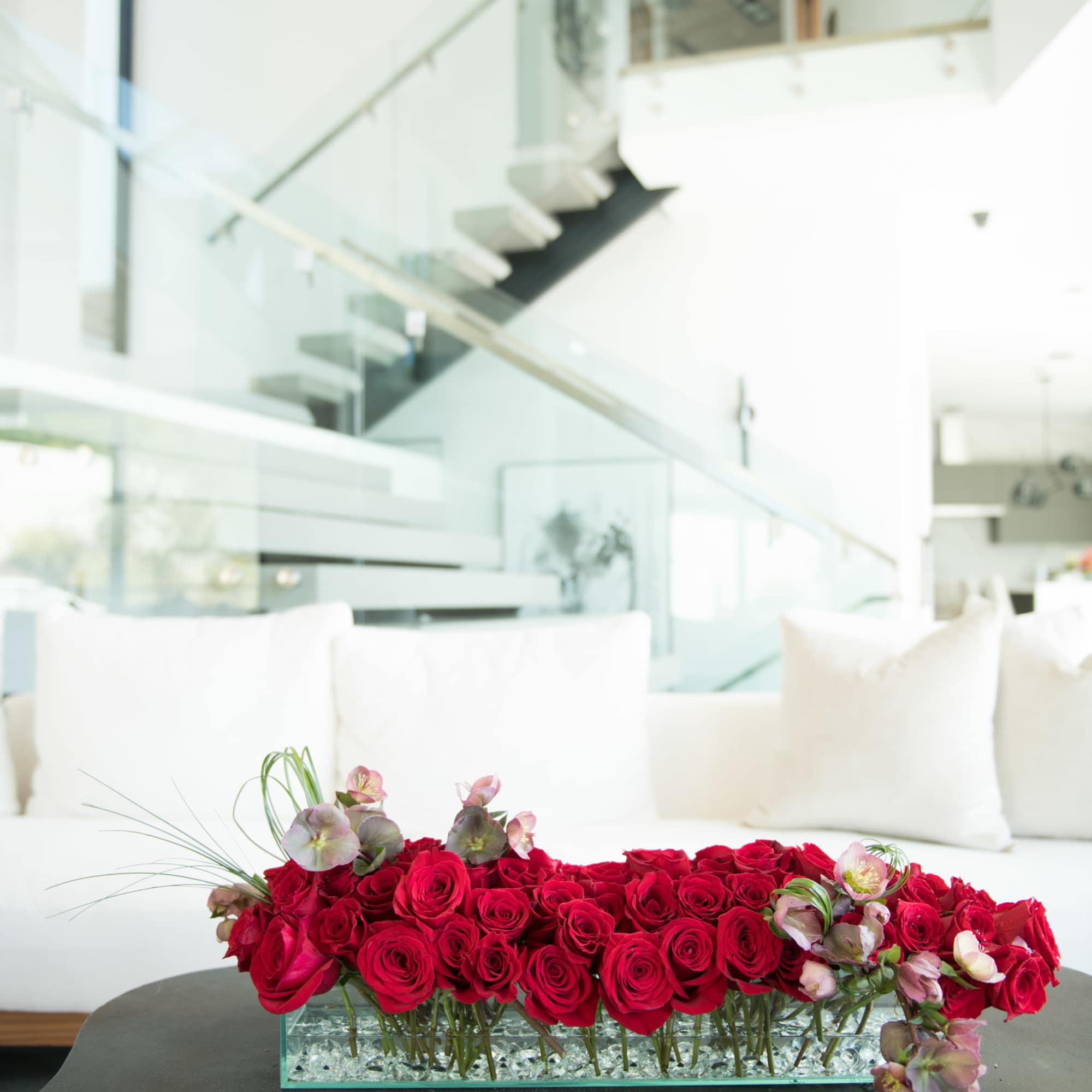 Luxury statement piece made using 6 Dozen Scarlet Red roses with an