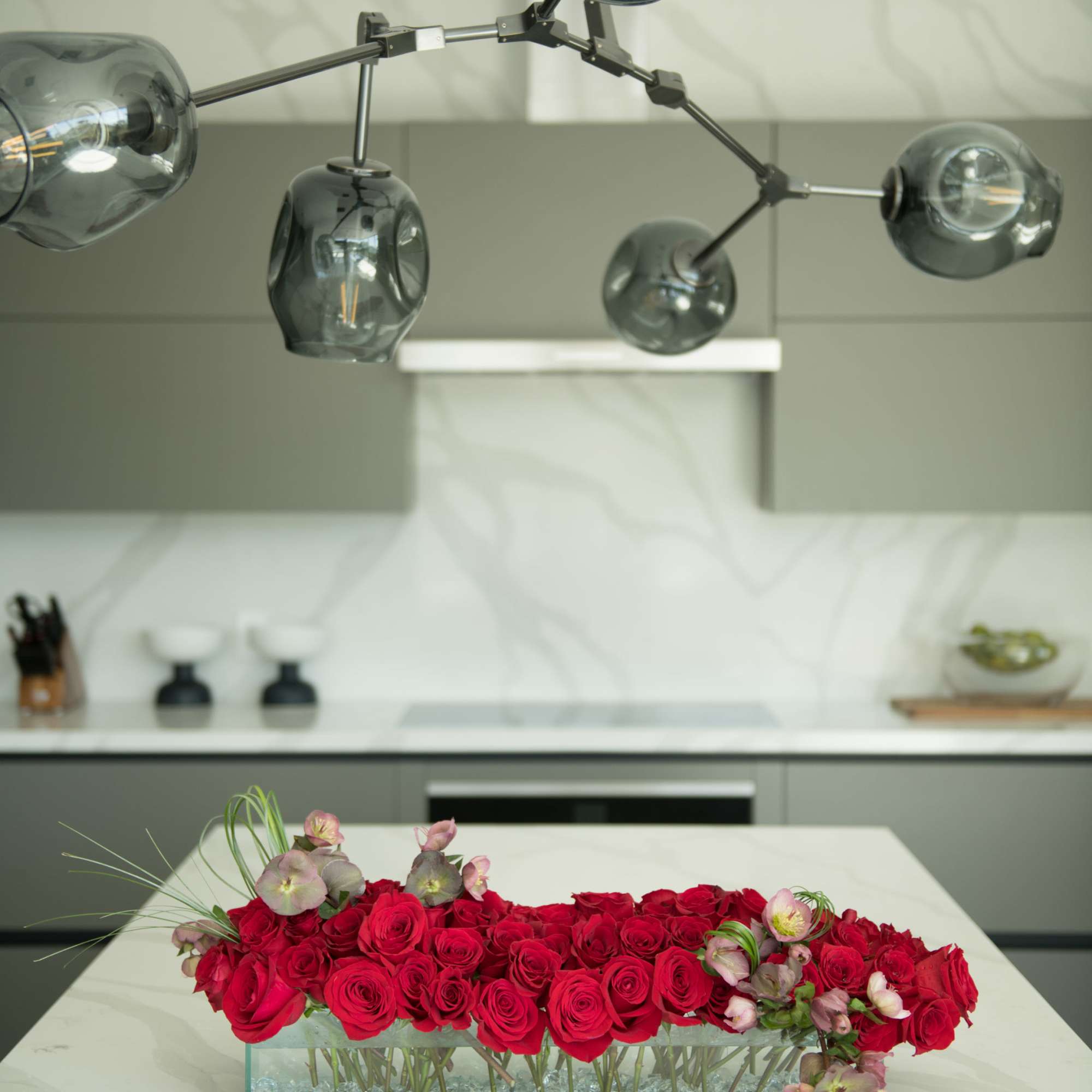 Luxury statement piece made using 6 Dozen Scarlet Red roses with an