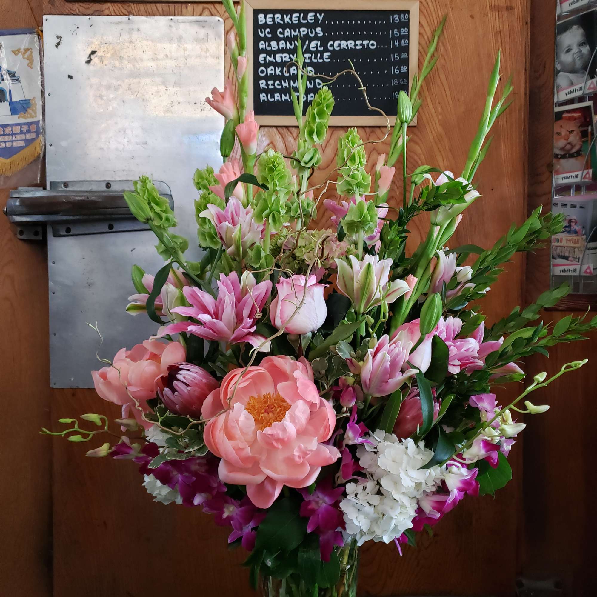 This showstopper is filled with lush hydrangeas, fragrant stargazer lilies, peonies. lilac