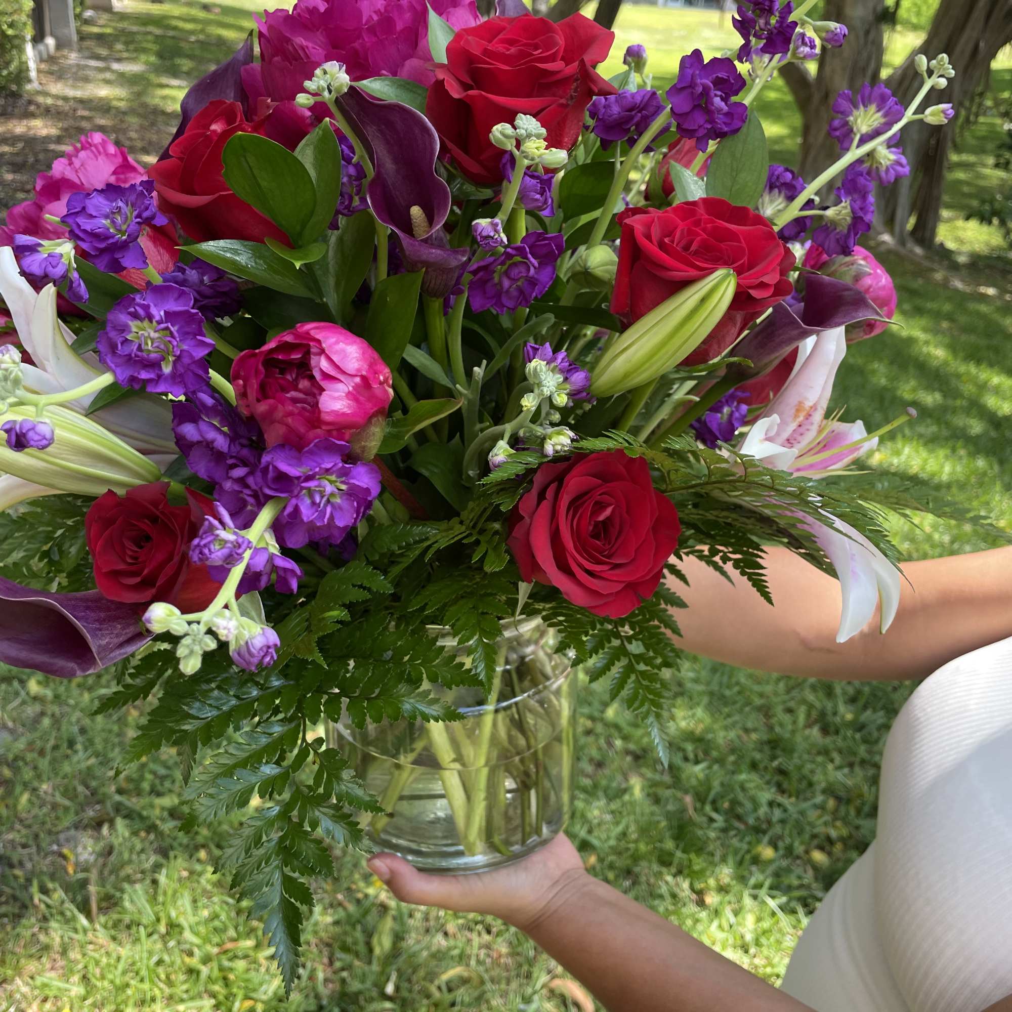 This dreamy jewel toned bouquet combines bold color and eye catching texture This dreamy jewel toned bouquet combines bold color and eye catching texture
