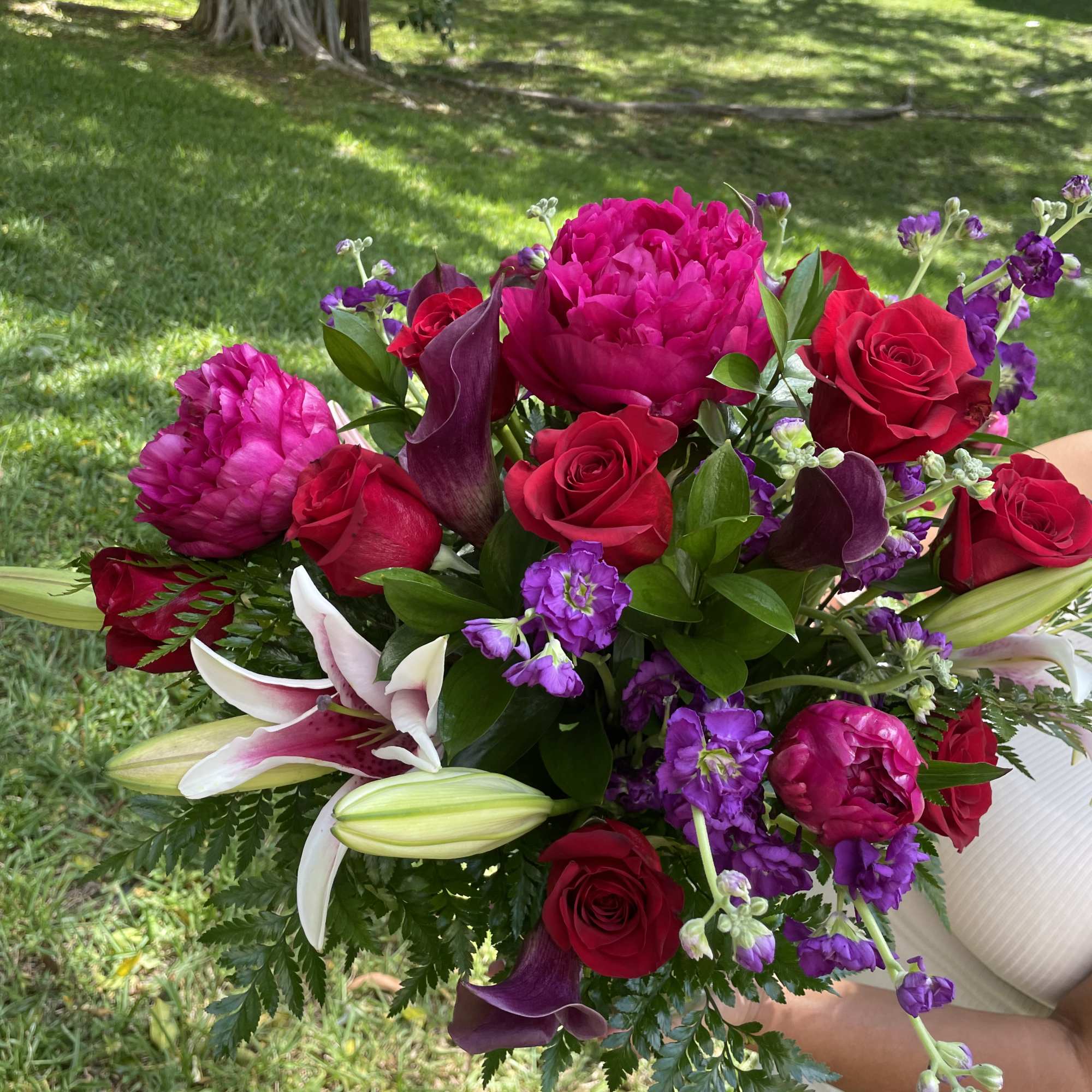 This dreamy jewel toned bouquet combines bold color and eye catching texture This dreamy jewel toned bouquet combines bold color and eye catching texture