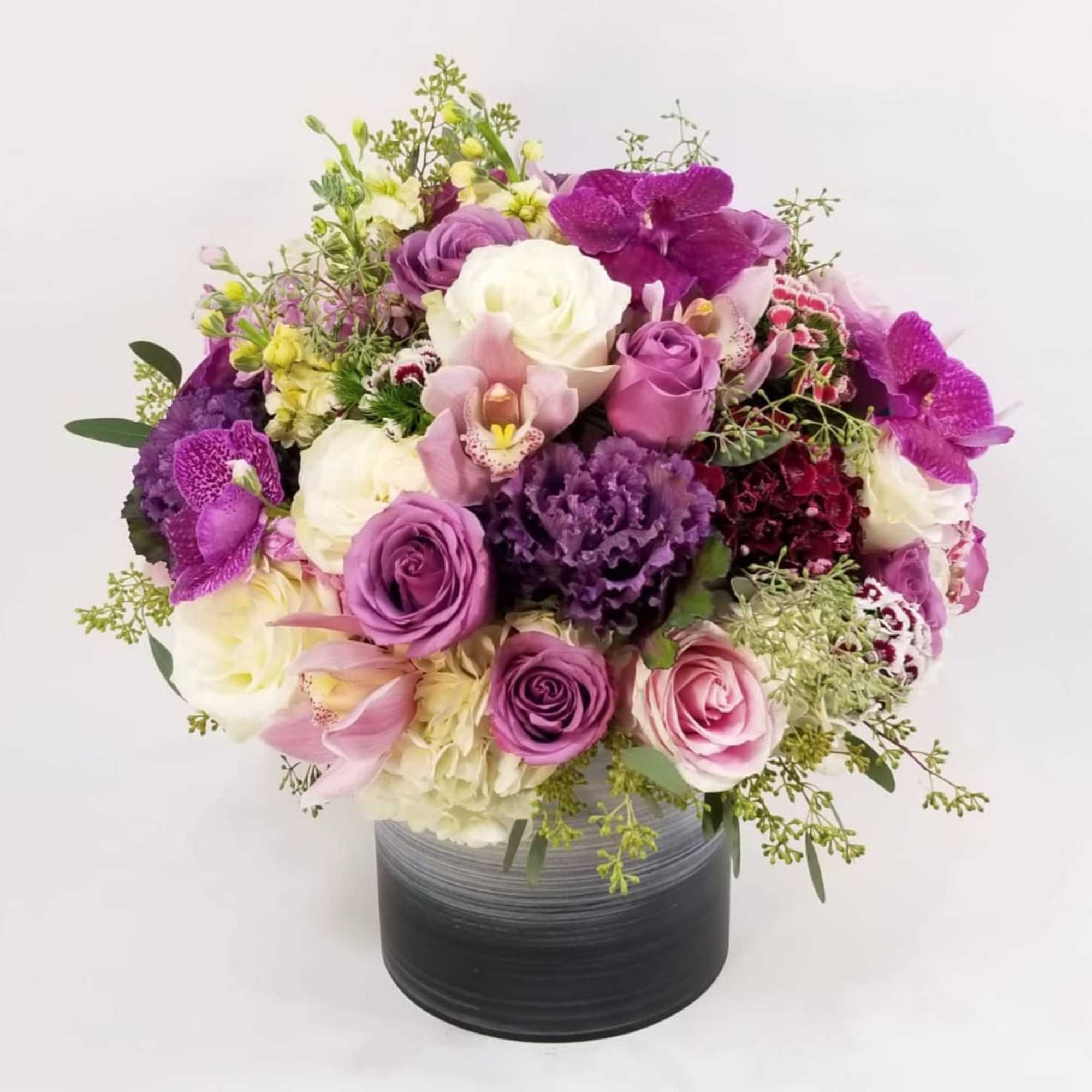 Beautiful French Style Arrangement in a ceramic vase with White Roses, Lavender Beautiful French Style Arrangement in a ceramic vase with White Roses, Lavender