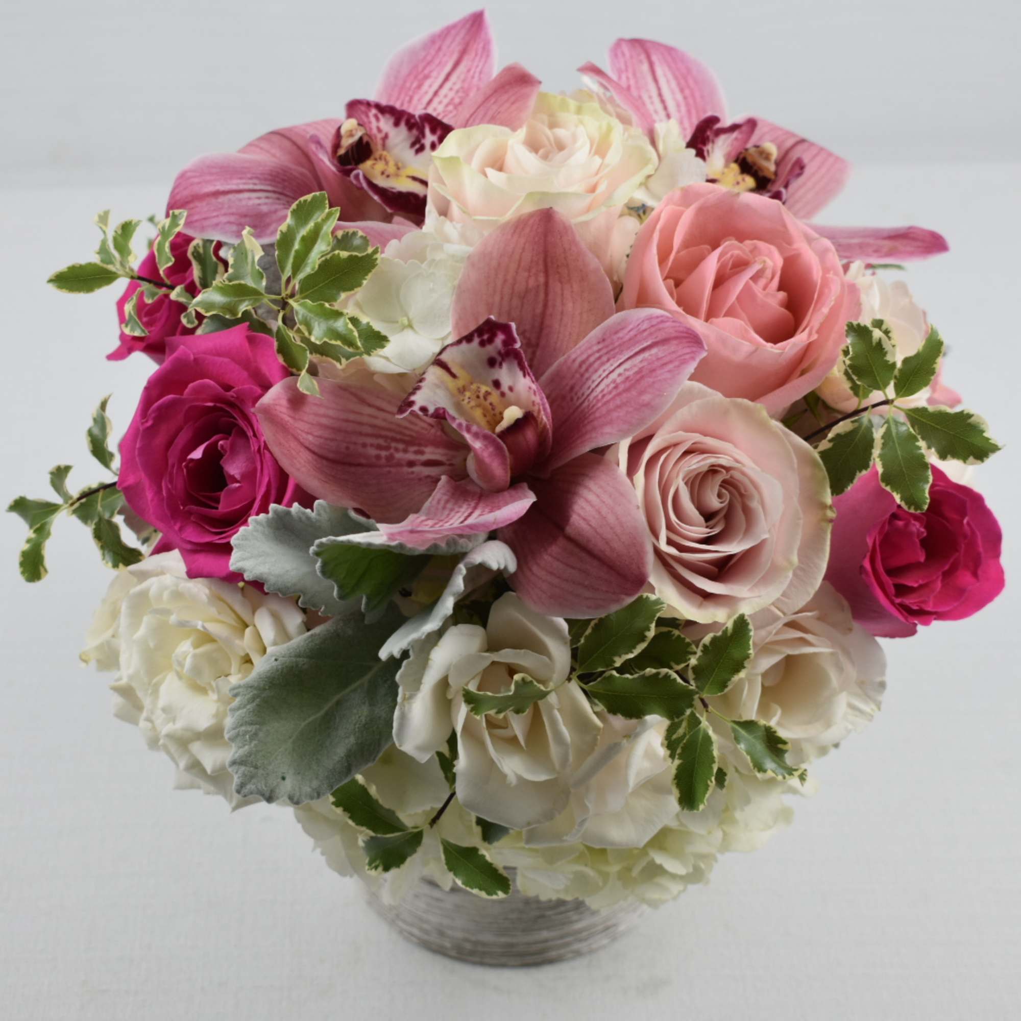 This beautiful small arrangement is the perfect gift for any occasion 
It
