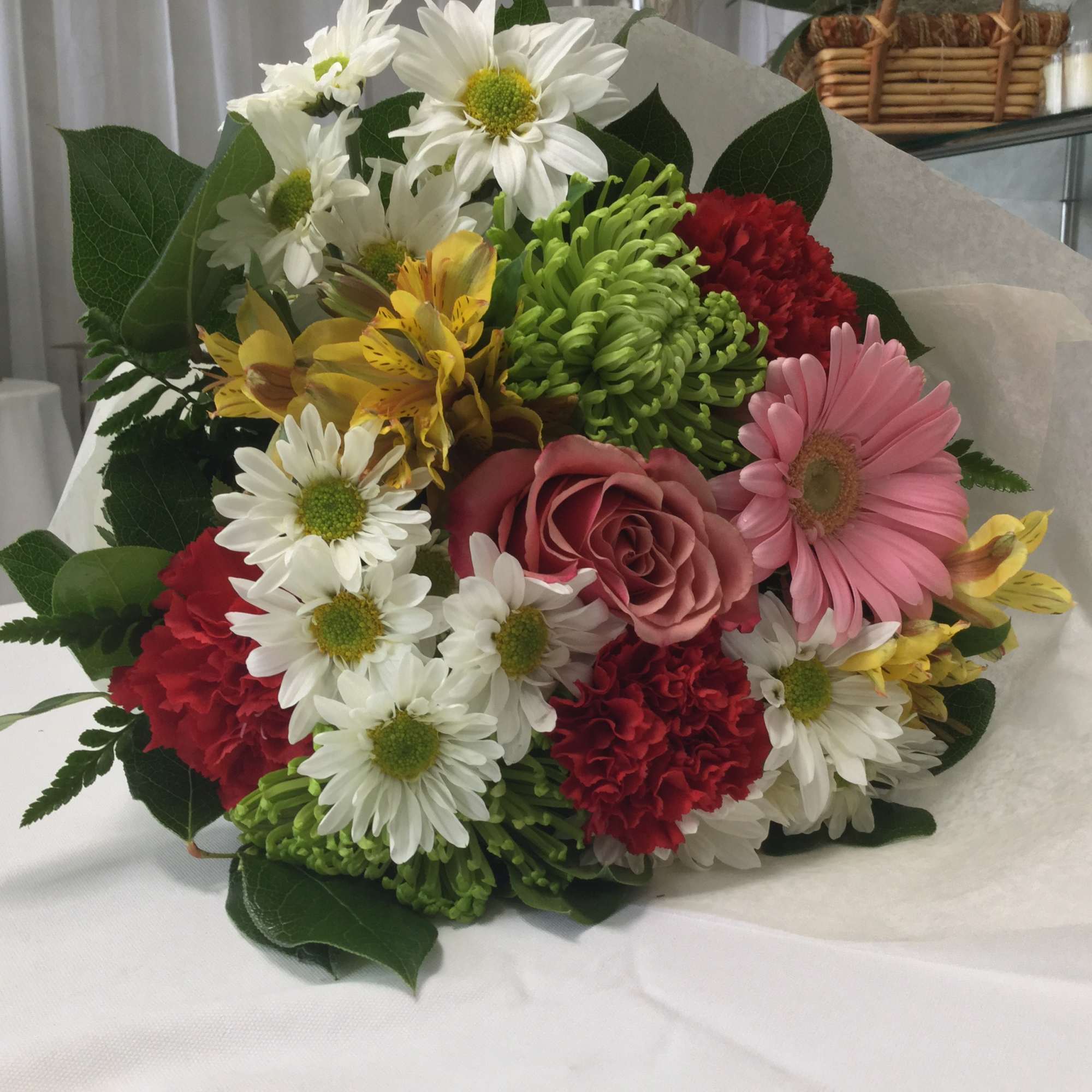 This stunning bouquet of fresh mixed flowers is full of life, love