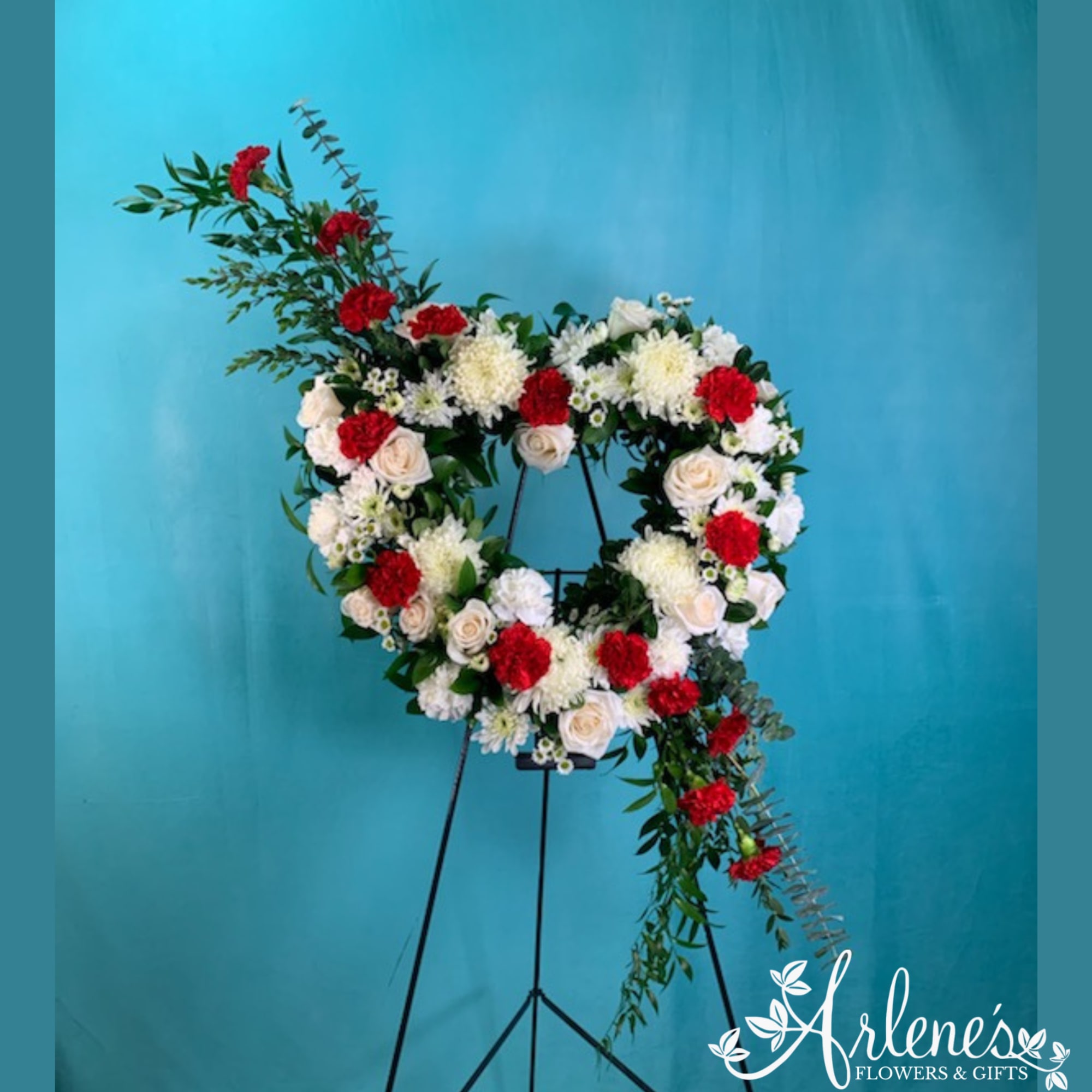 18 inch heart easel. Please call for availability and color scheme. 18 inch heart easel. Please call for availability and color scheme.