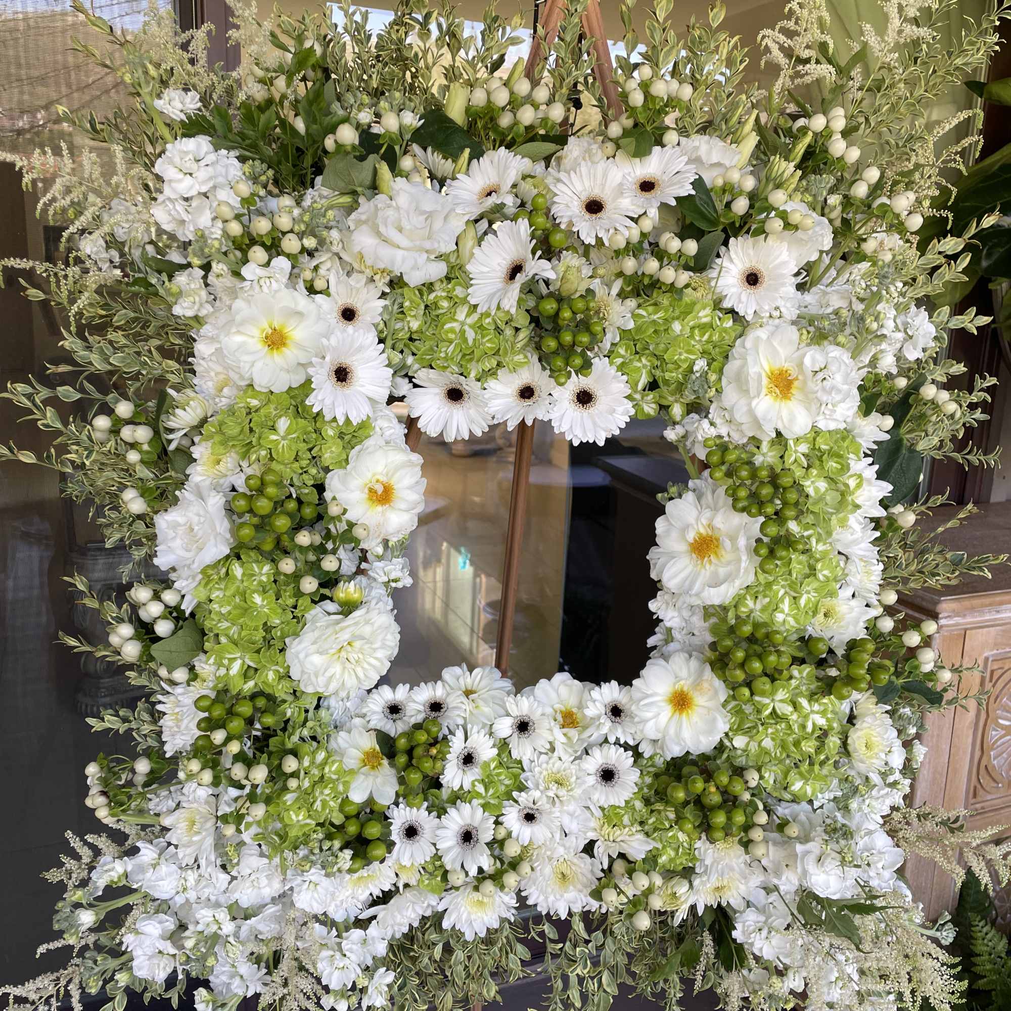 Green hydrangeas, white dahlias, white Gerbera daisy, white stock