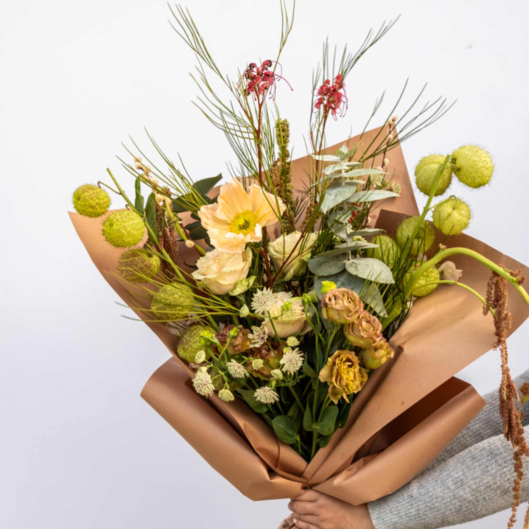 Behold our grand and divine hand-tied flower arrangement intimately boasting a resplendent