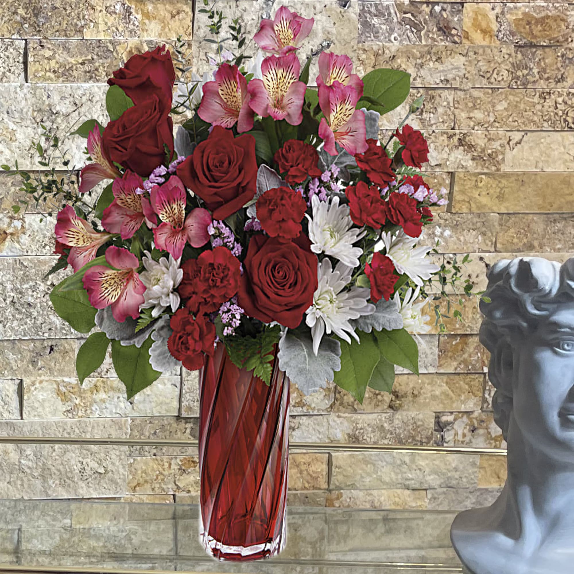 Celebrate the splendor of true love with this radiant red rose bouquet