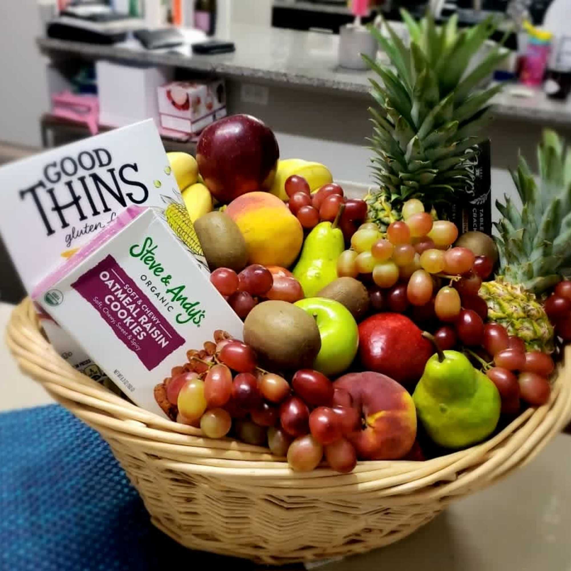 Baskets of Fruits. Apple, Grapes, Crackers, Peaches, Bananas, Pineapples, Pears and Kiwis.