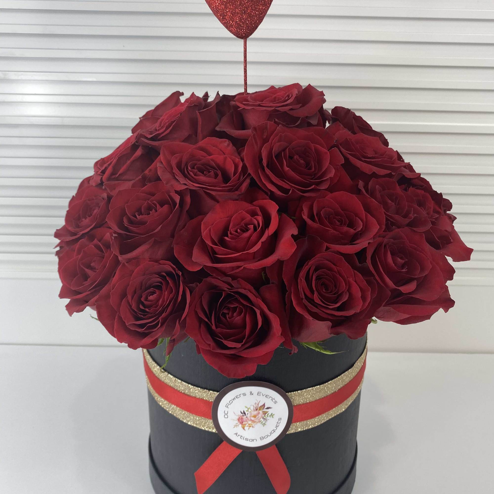 Romantic black round box with 38-40 red roses. 