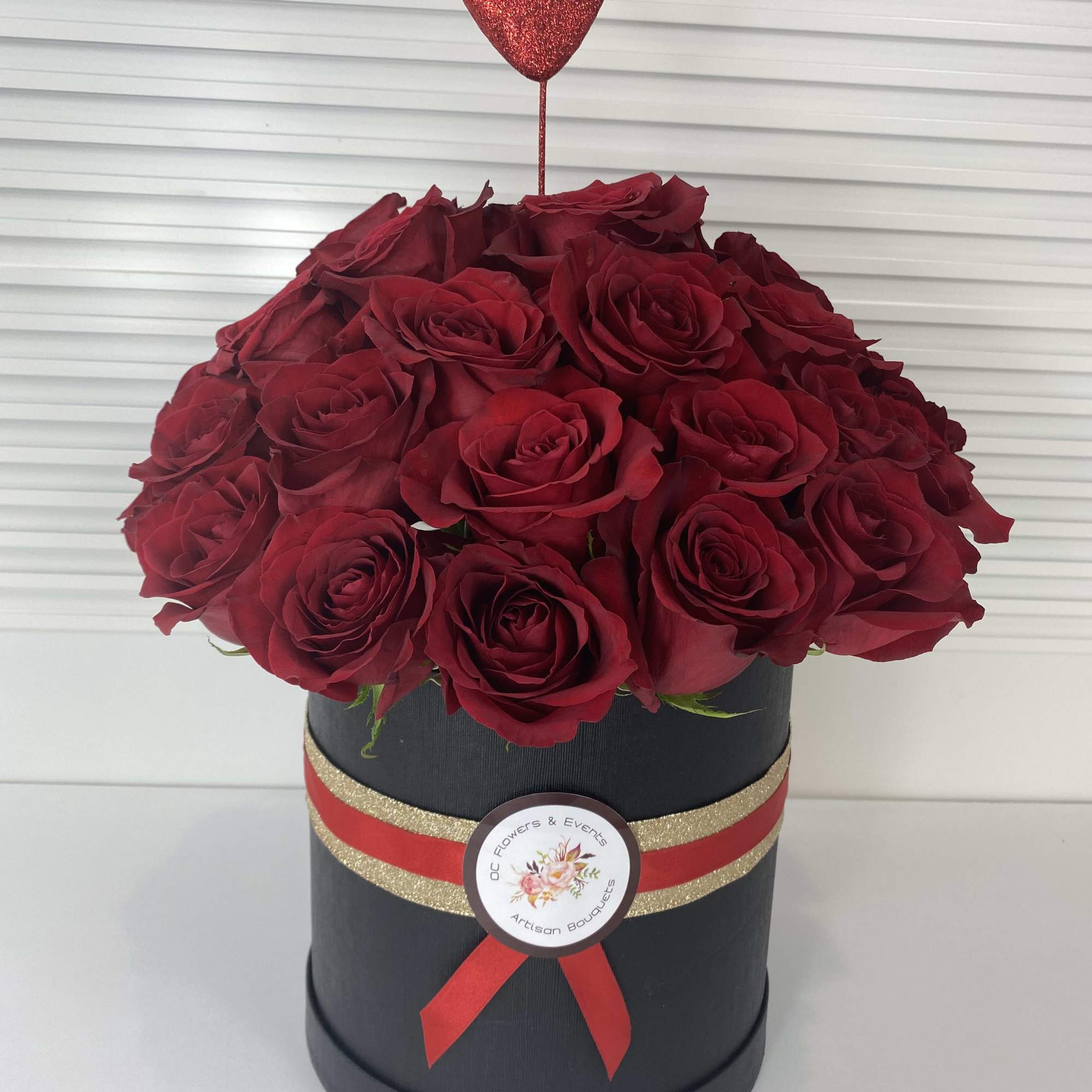 Romantic black round box with 38-40 red roses. 