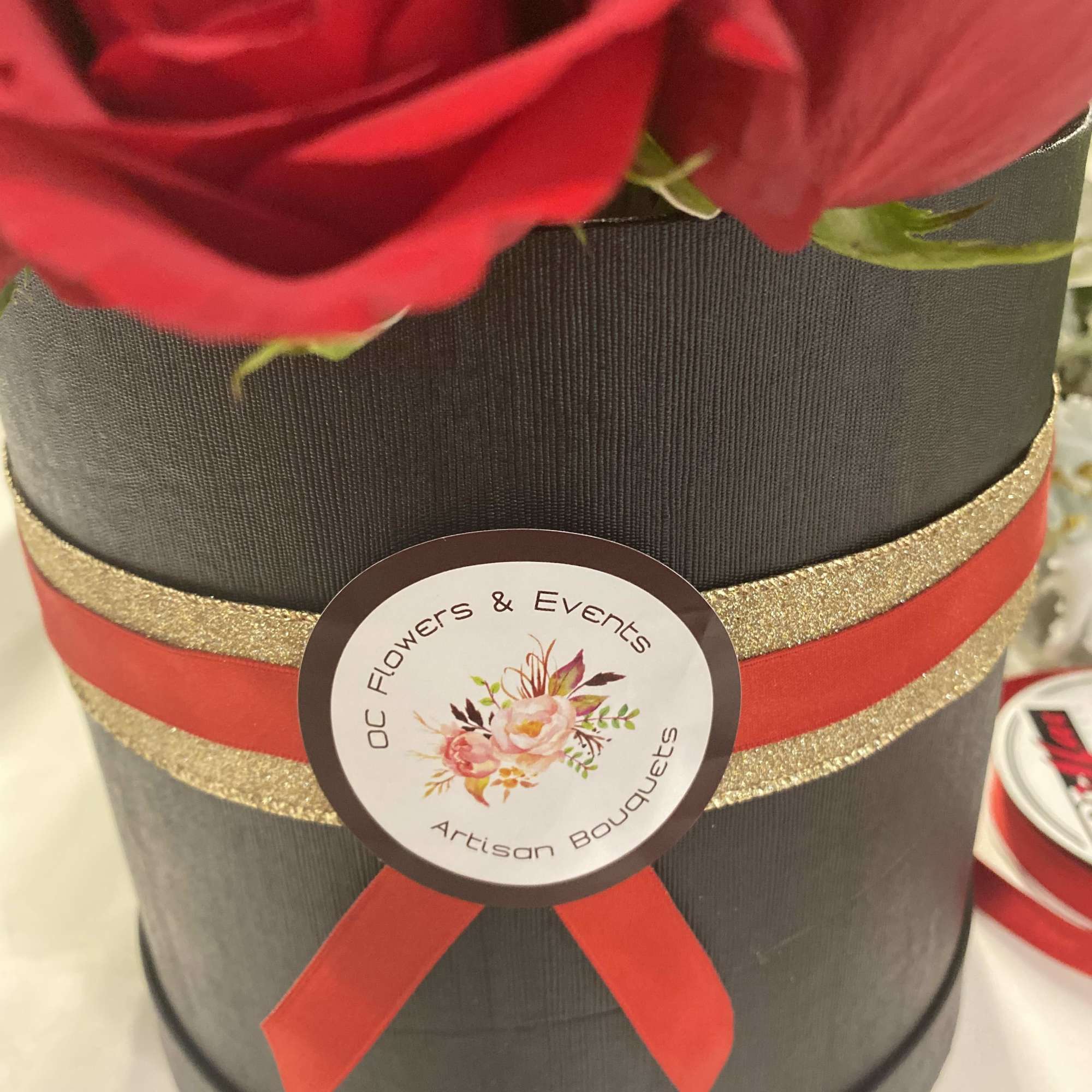 Romantic black round box with 38-40 red roses. 