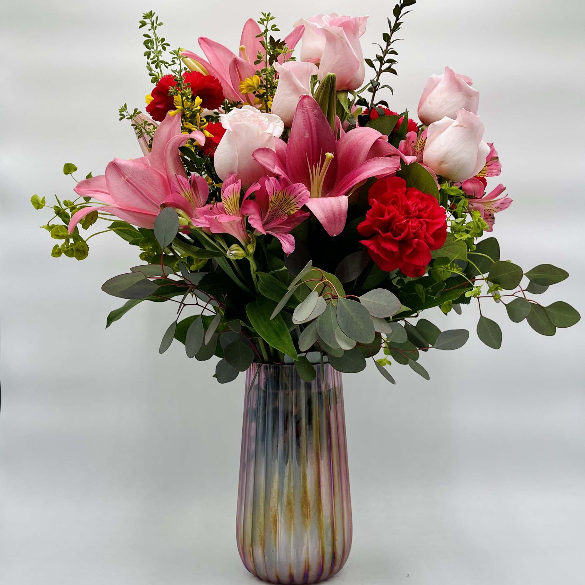 Mom will adore this gorgeous bouquet featuring pink roses and blooms overflowing Mom will adore this gorgeous bouquet featuring pink roses and blooms overflowing