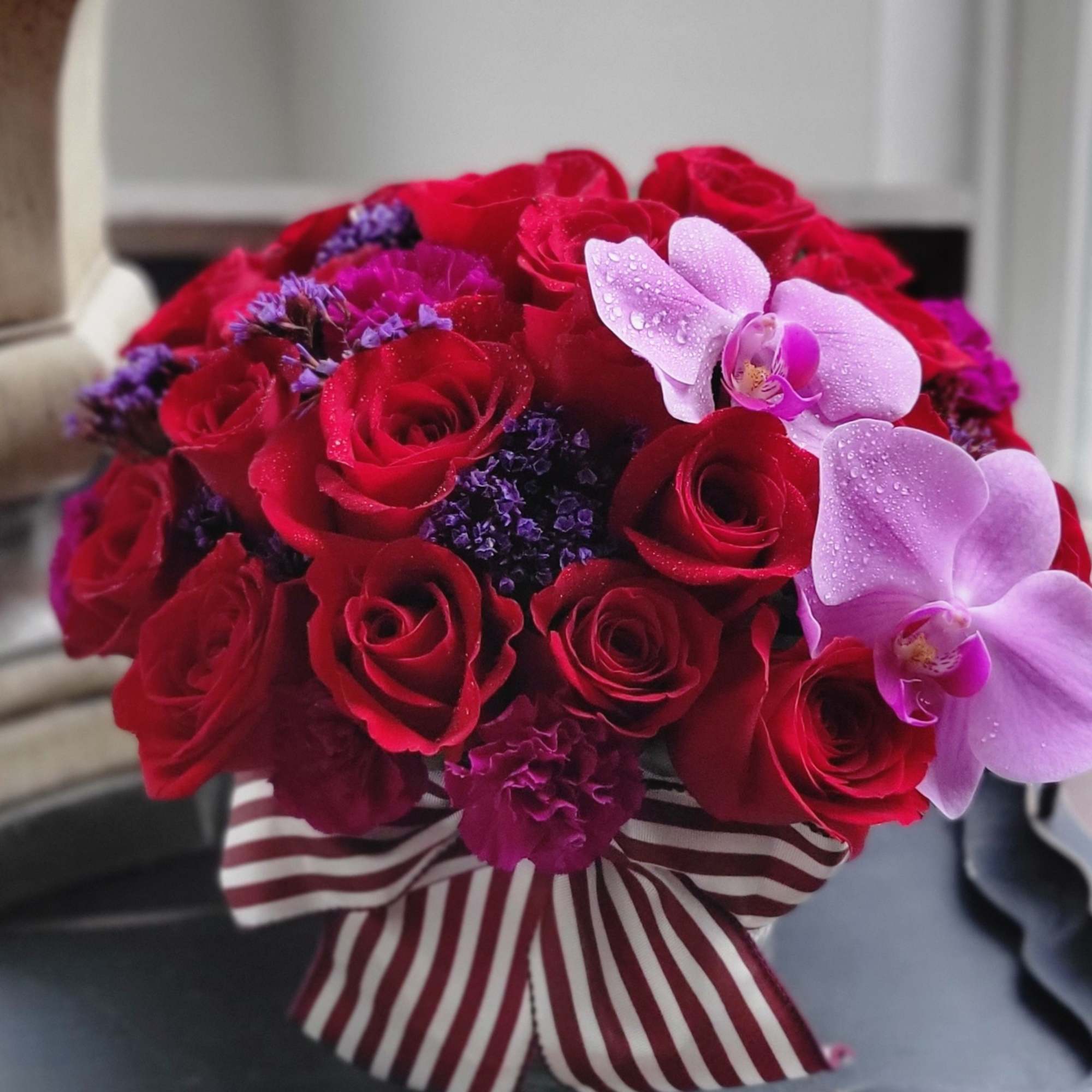 Roses, tracheliums, phalaenopsis orchids