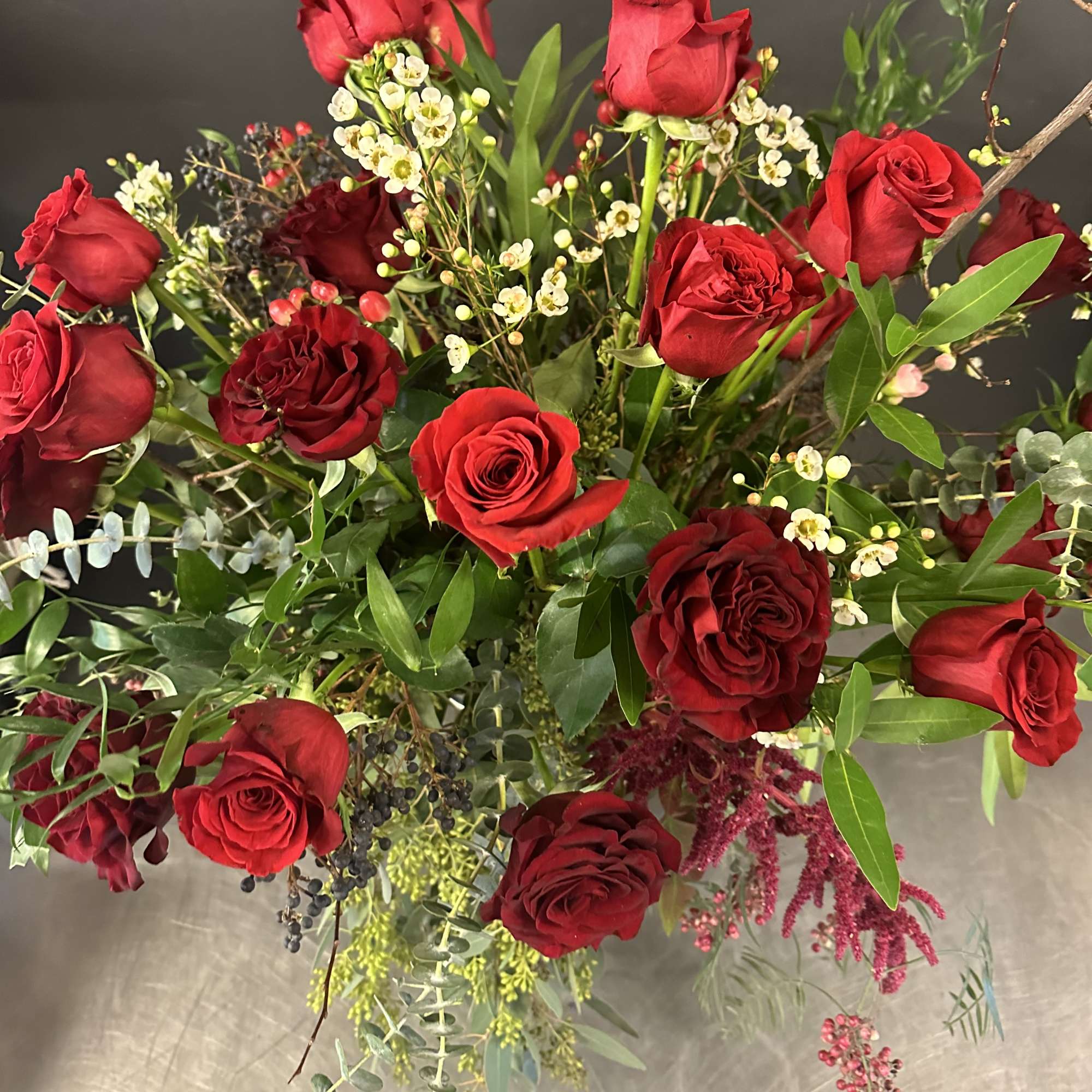 Treat your love to a dozen premium red roses