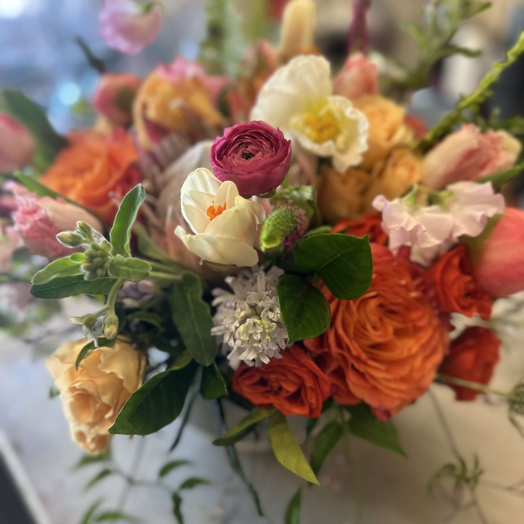 Perfect bouquet of softer and sweet blooms in a clear glass vase