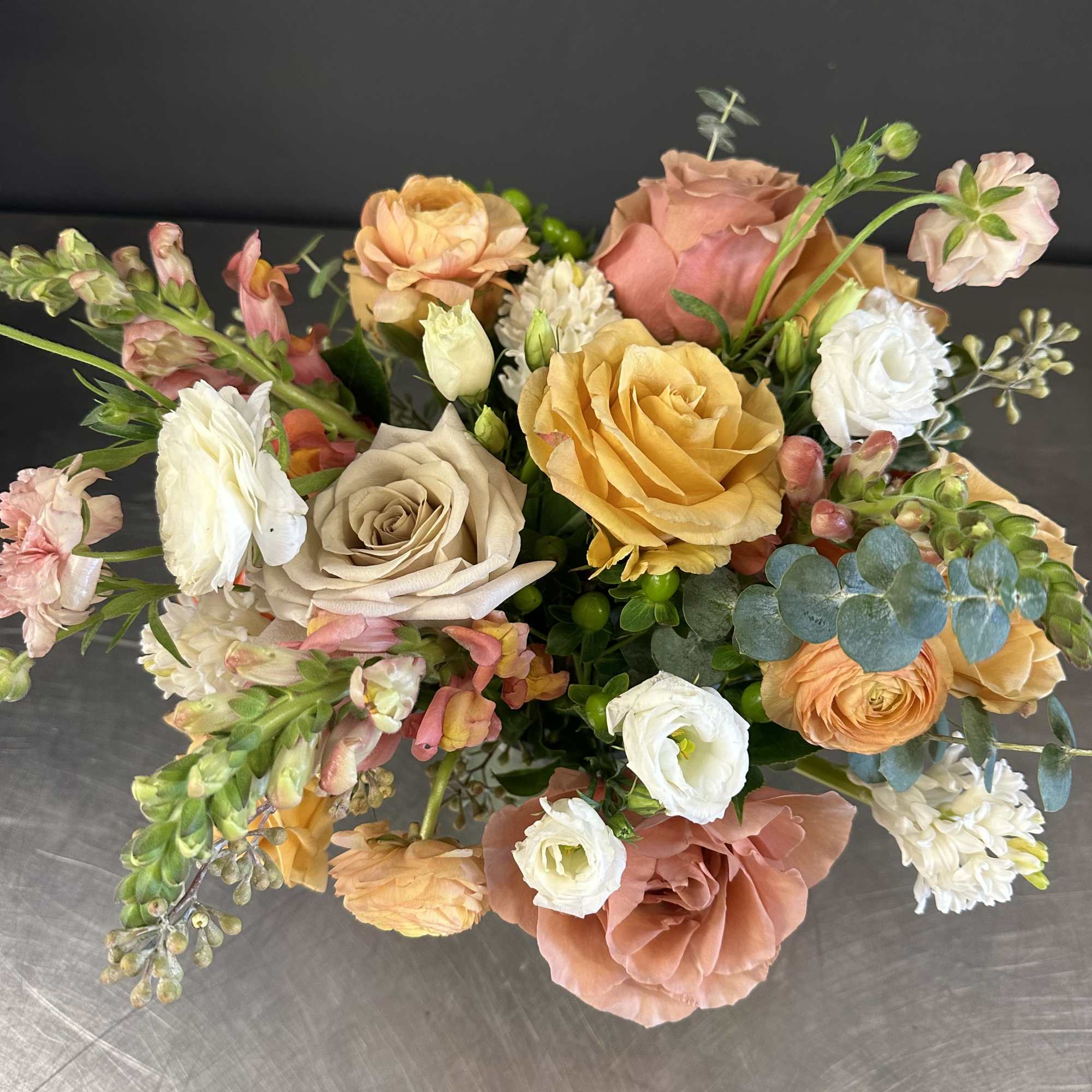 This is a blend of soft tones of coral, pinks, peach, toffee