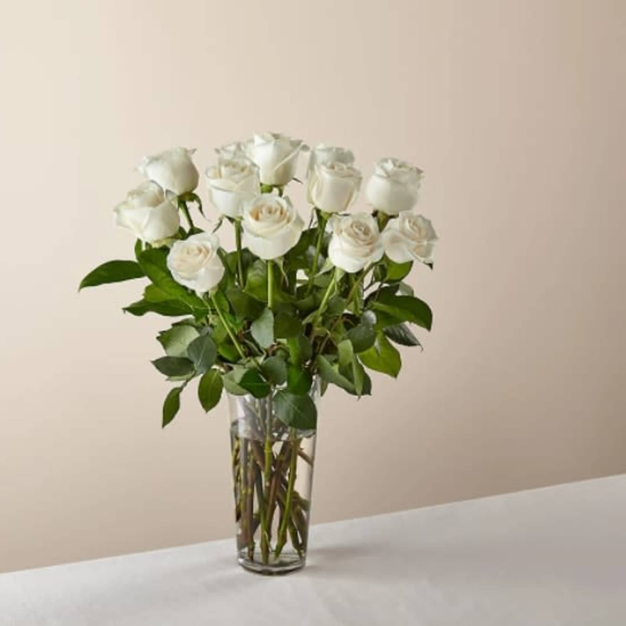 White roses are elegant, luminous, and beautifully accent any room. With a