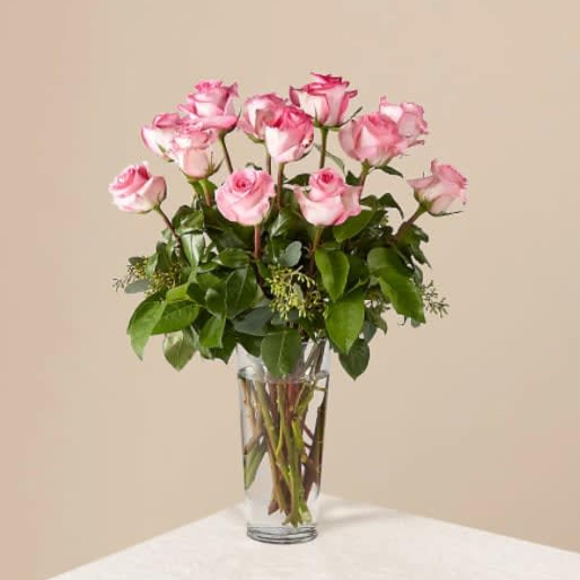 Picture-perfect soft pink roses make a beautiful gift for the lovely lady