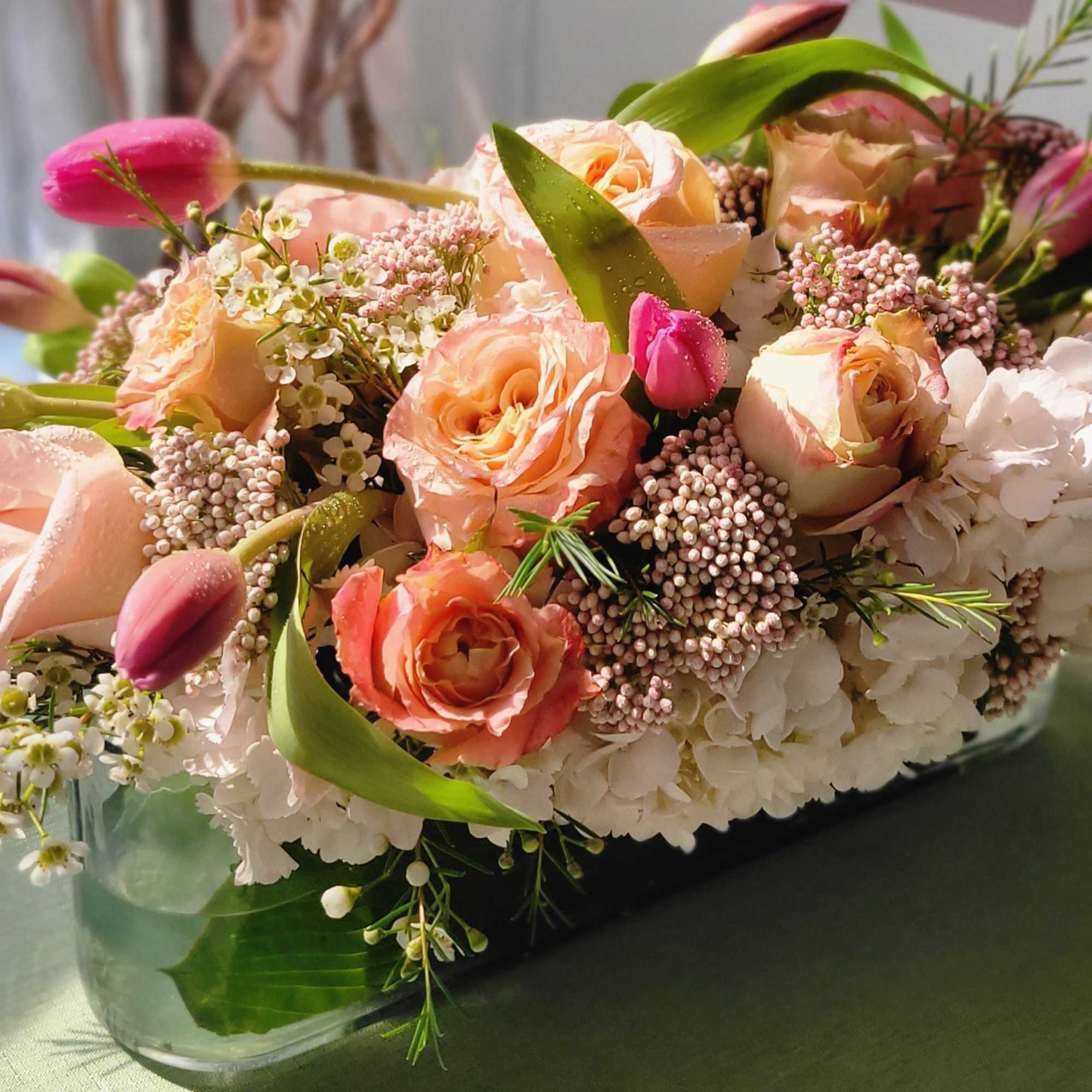 Hydrangeas, roses, tulips, rice flowers, wax flowers