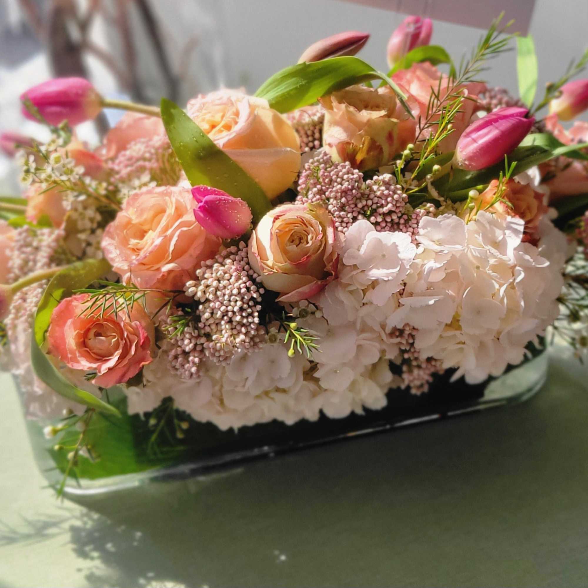 Hydrangeas, roses, tulips, rice flowers, wax flowers