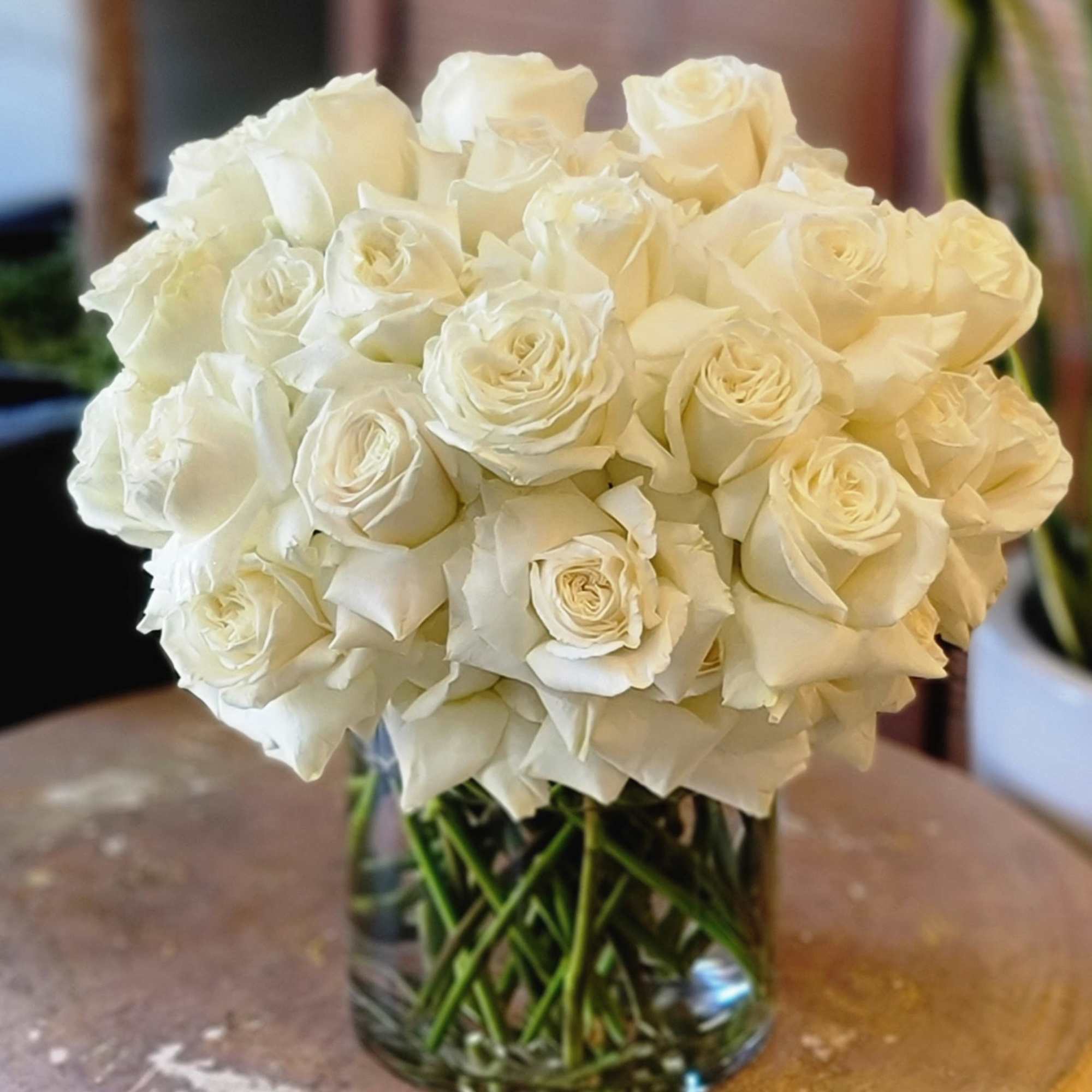 Snow White Roses in a Glass Vase in Los Angeles, CA | Floral