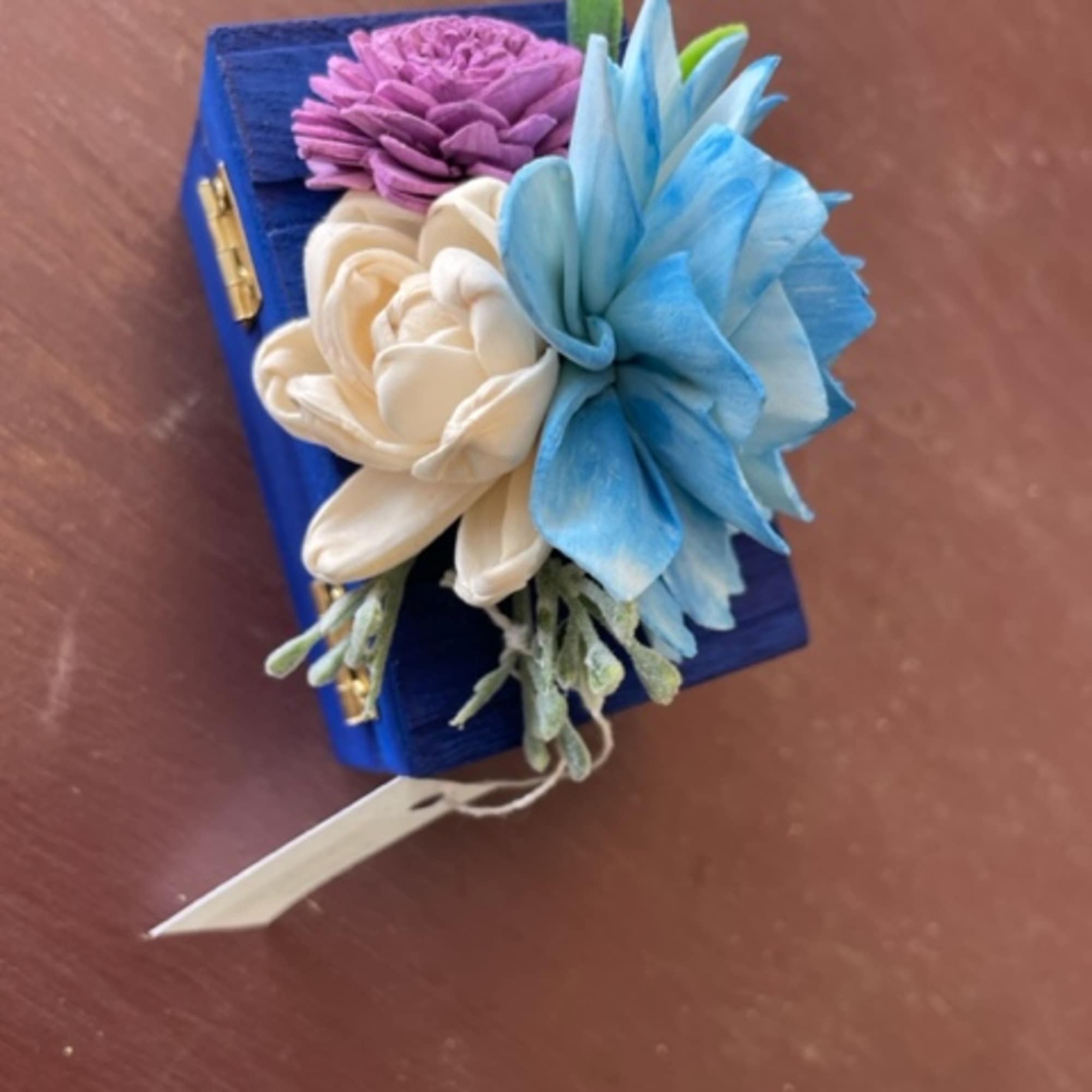 Small blue hand-painted jewelry/gift box with light blue, purple, and cream sola