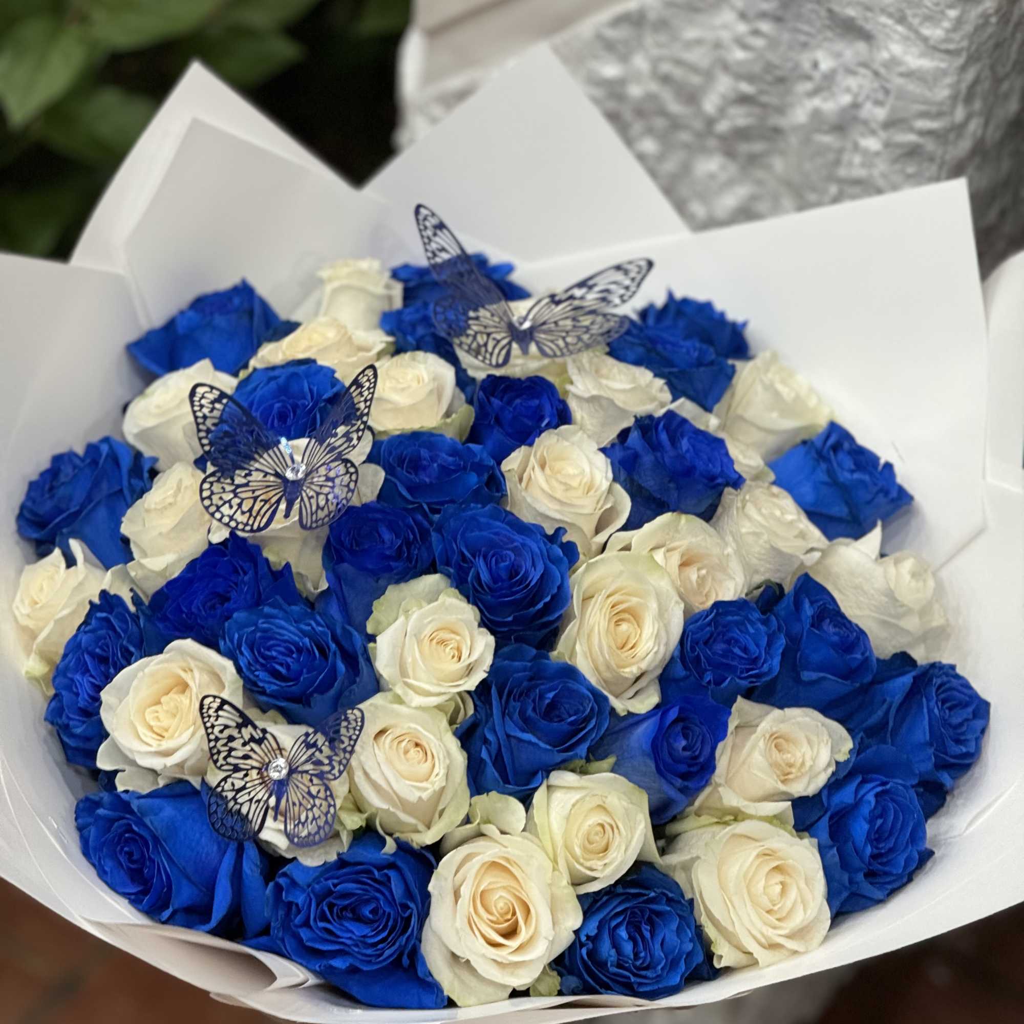 Beautiful royal blues mixed with right roses to create a beautiful bouquet