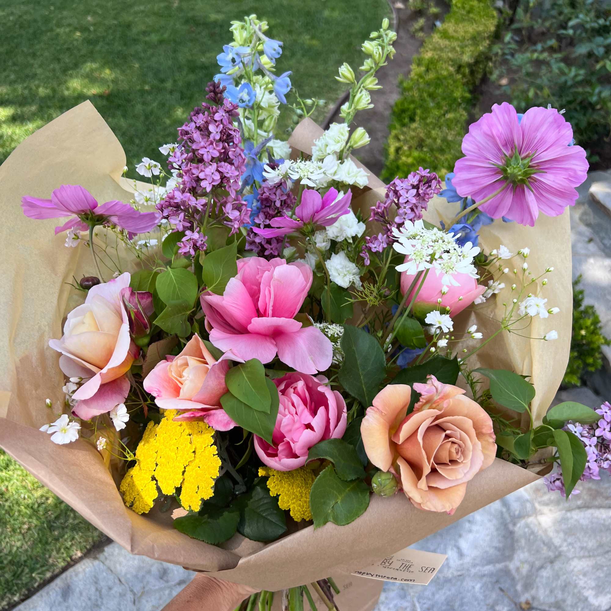 Enjoy our signature paper wrapped style, hand tied and filled with the