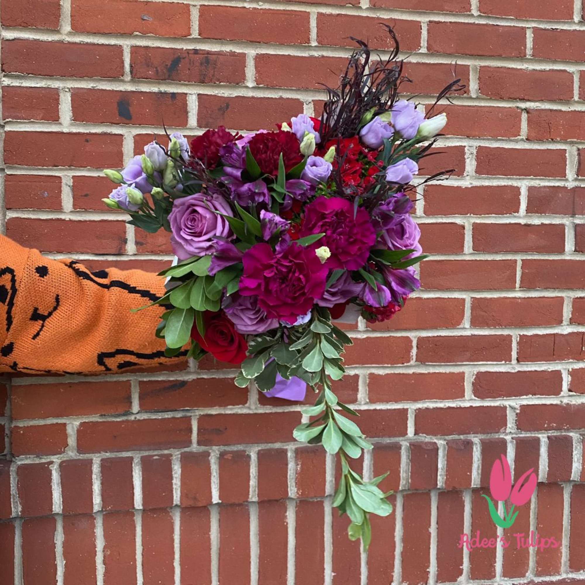 Behold our exquisite bouquet, meticulously curated with radiant blossoms that seamlessly blend