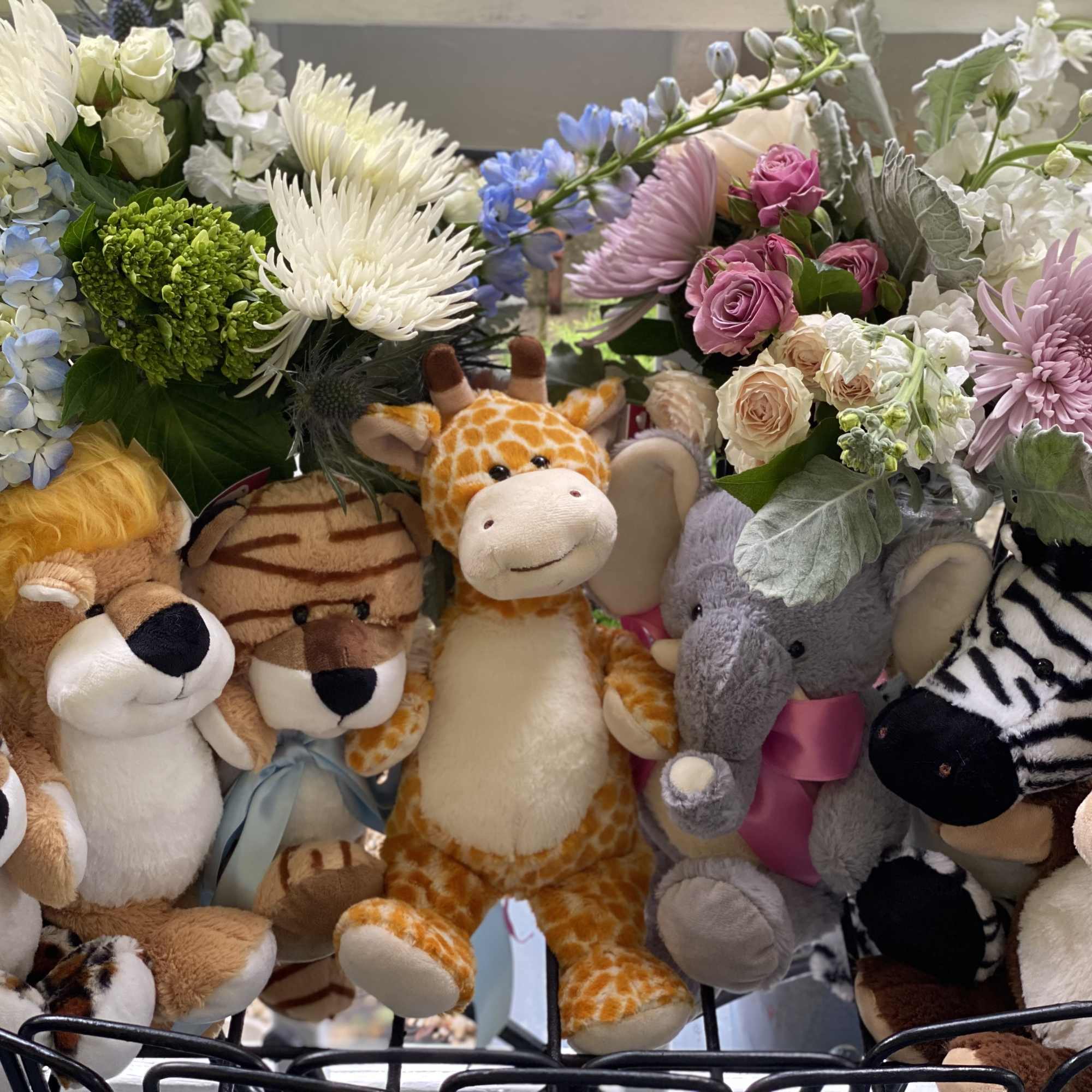 flowers with stuffed animals