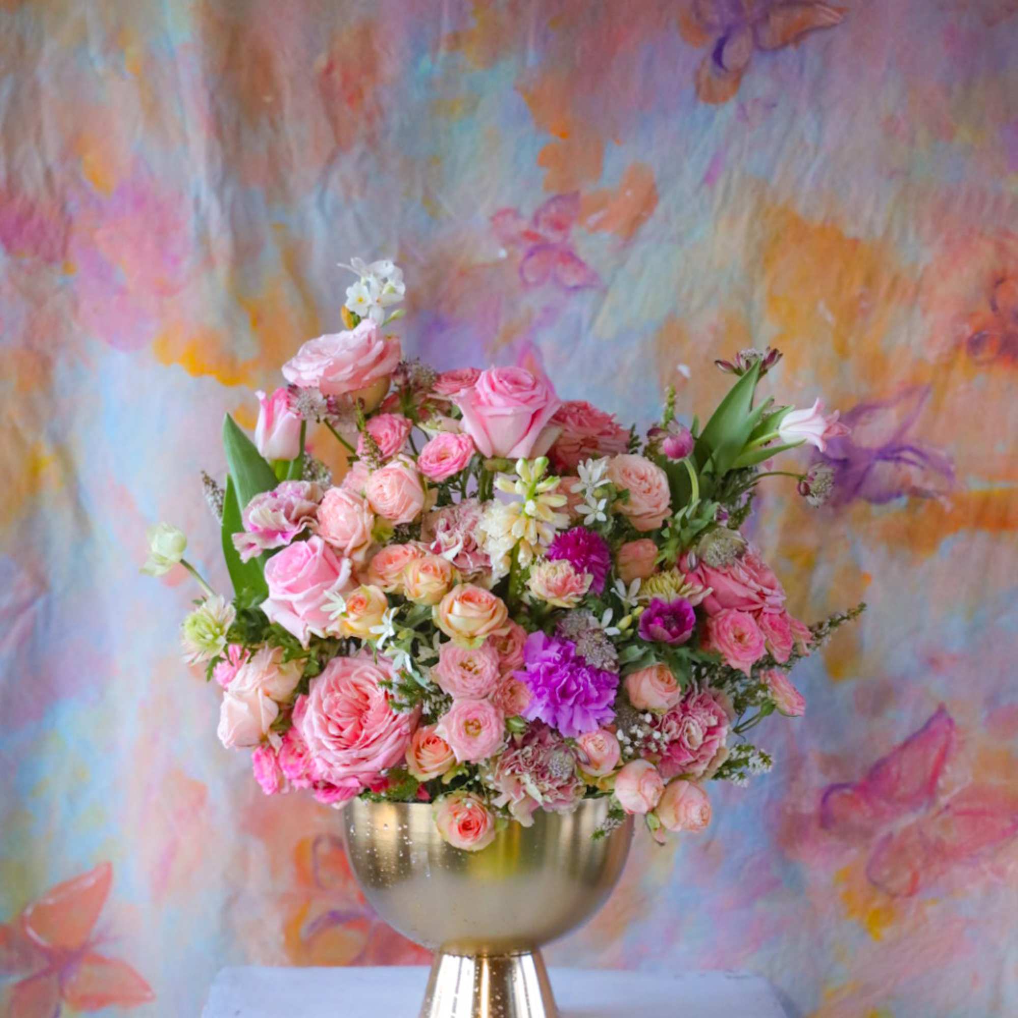 Resplendent Forester Butterfly Arrangement is for the JLo in your life. Graceful