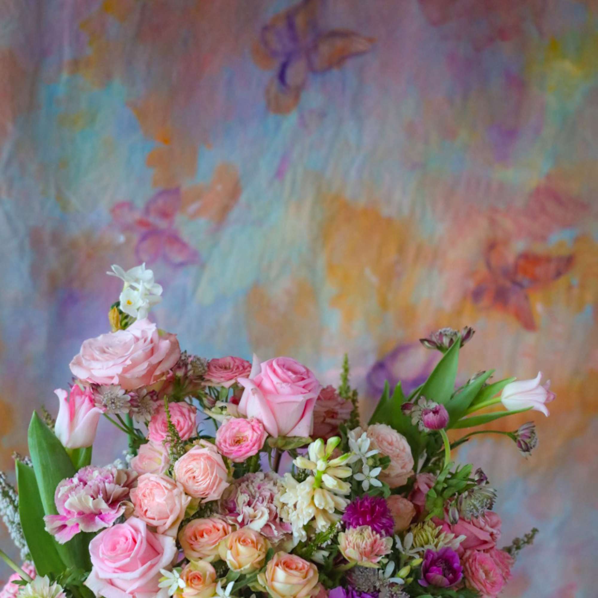 Resplendent Forester Butterfly Arrangement is for the JLo in your life. Graceful