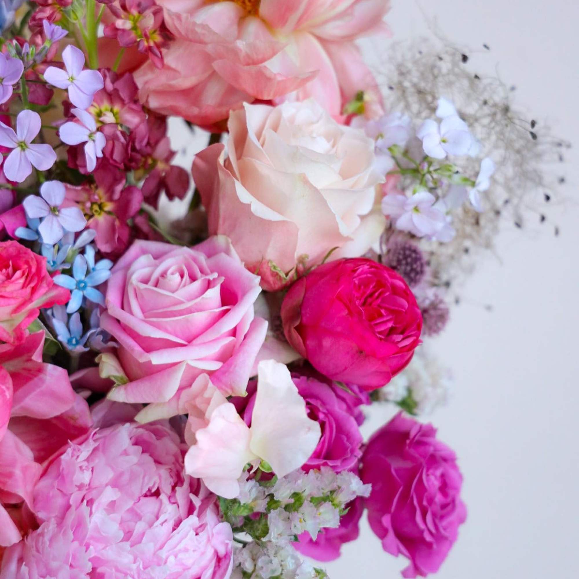 The Sweet Summer Arrangement captures the preciousness of the peak season, full