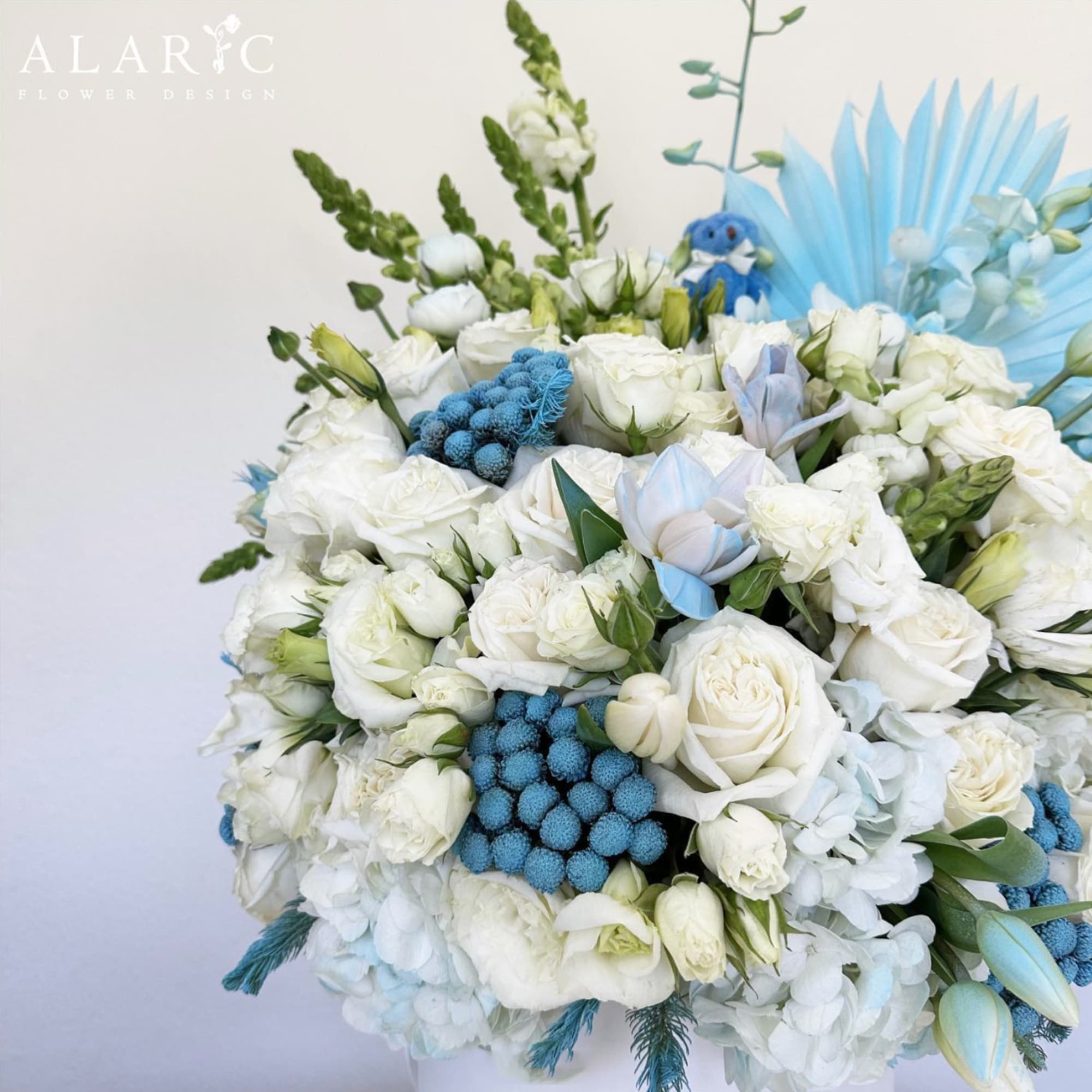 A super special baby boy arrangement in a small, medium or large