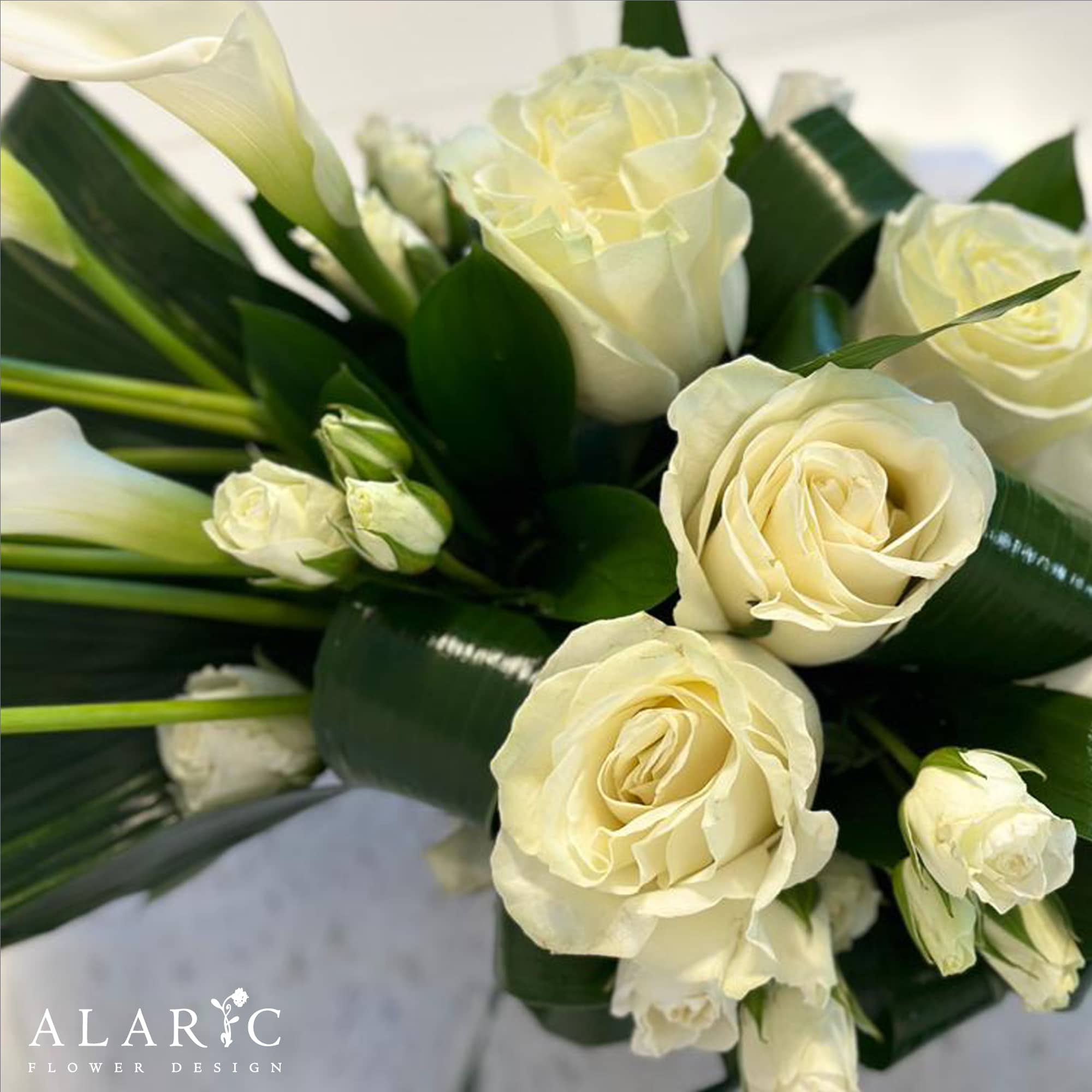 A very classy, simple and elegant arrangement suitable for many occasions:
&bull; Sympathy
&bull;