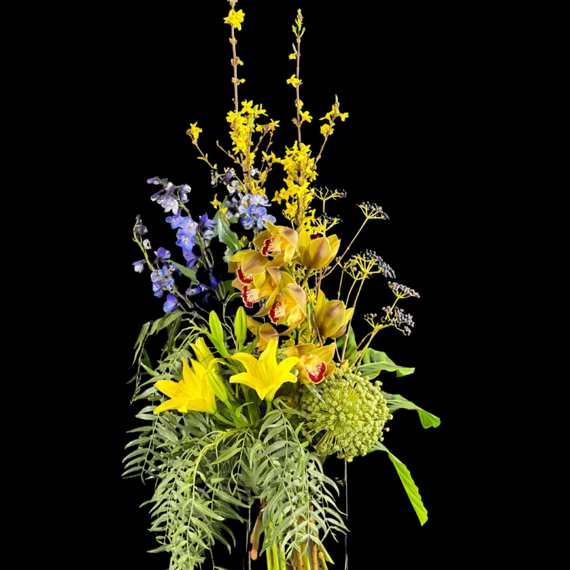 A grand, tropical, &amp; elegant fresh cut flower arrangement designed with Yellow-blushed
