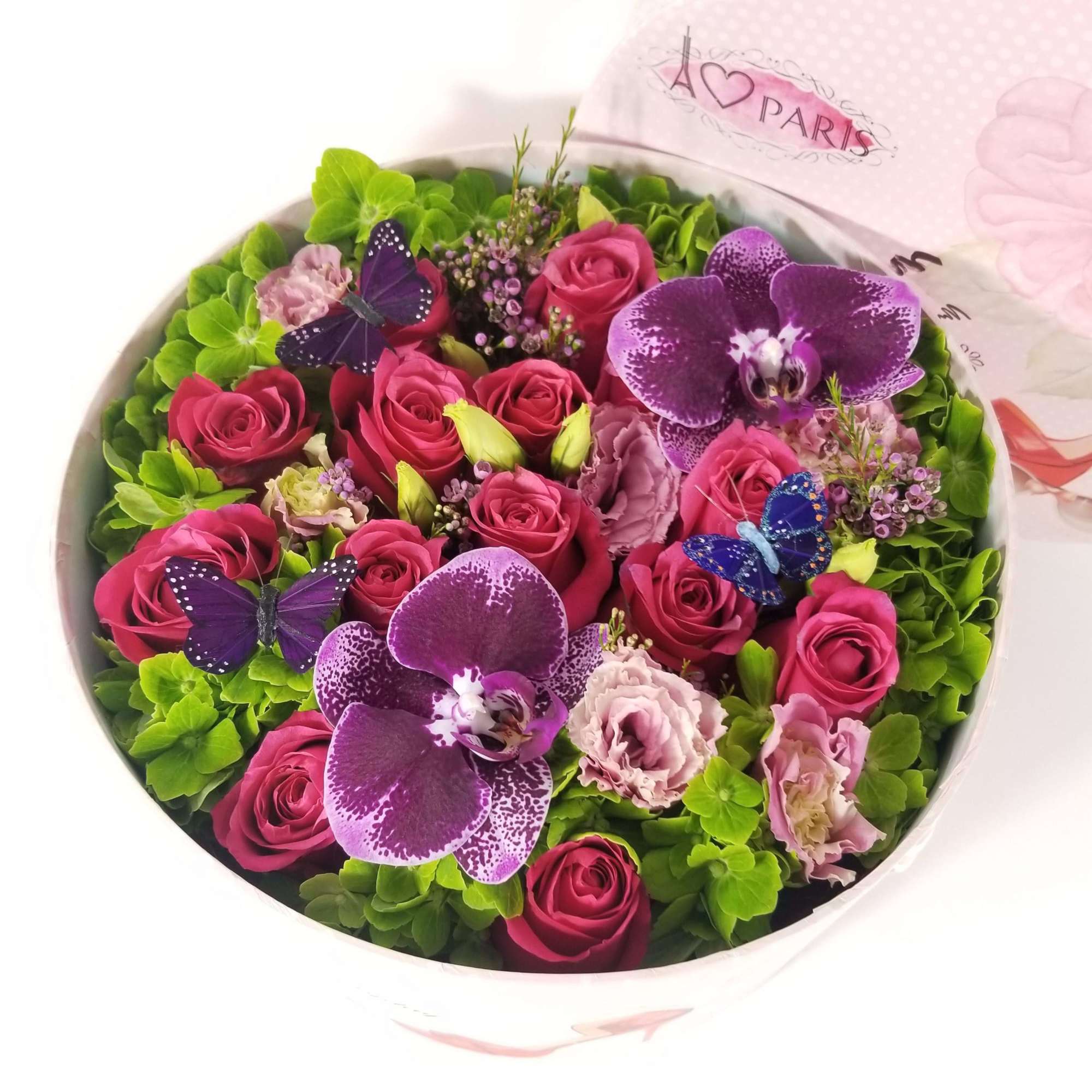Green Hydrangeas, Hot Pink Roses, Pink Lisianthus, Phalaenopsis Orchids, Floral Fillers, and Green Hydrangeas, Hot Pink Roses, Pink Lisianthus, Phalaenopsis Orchids, Floral Fillers, and