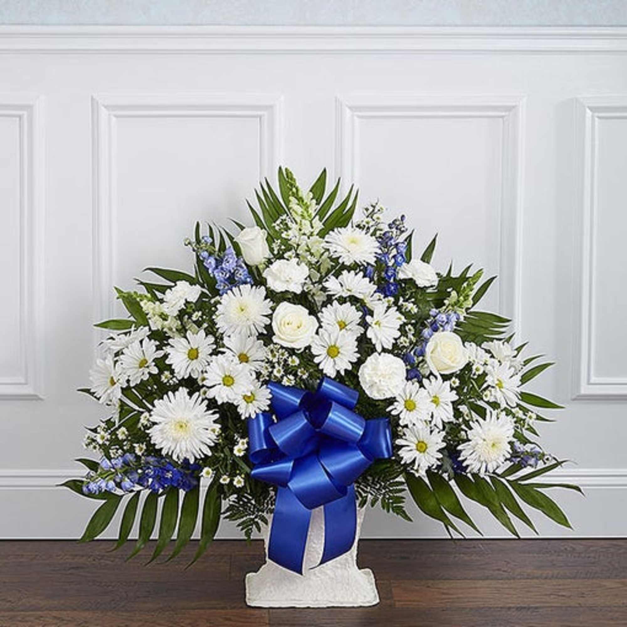 Our elegant floor basket arrangement, handcrafted by our caring florists with pristine