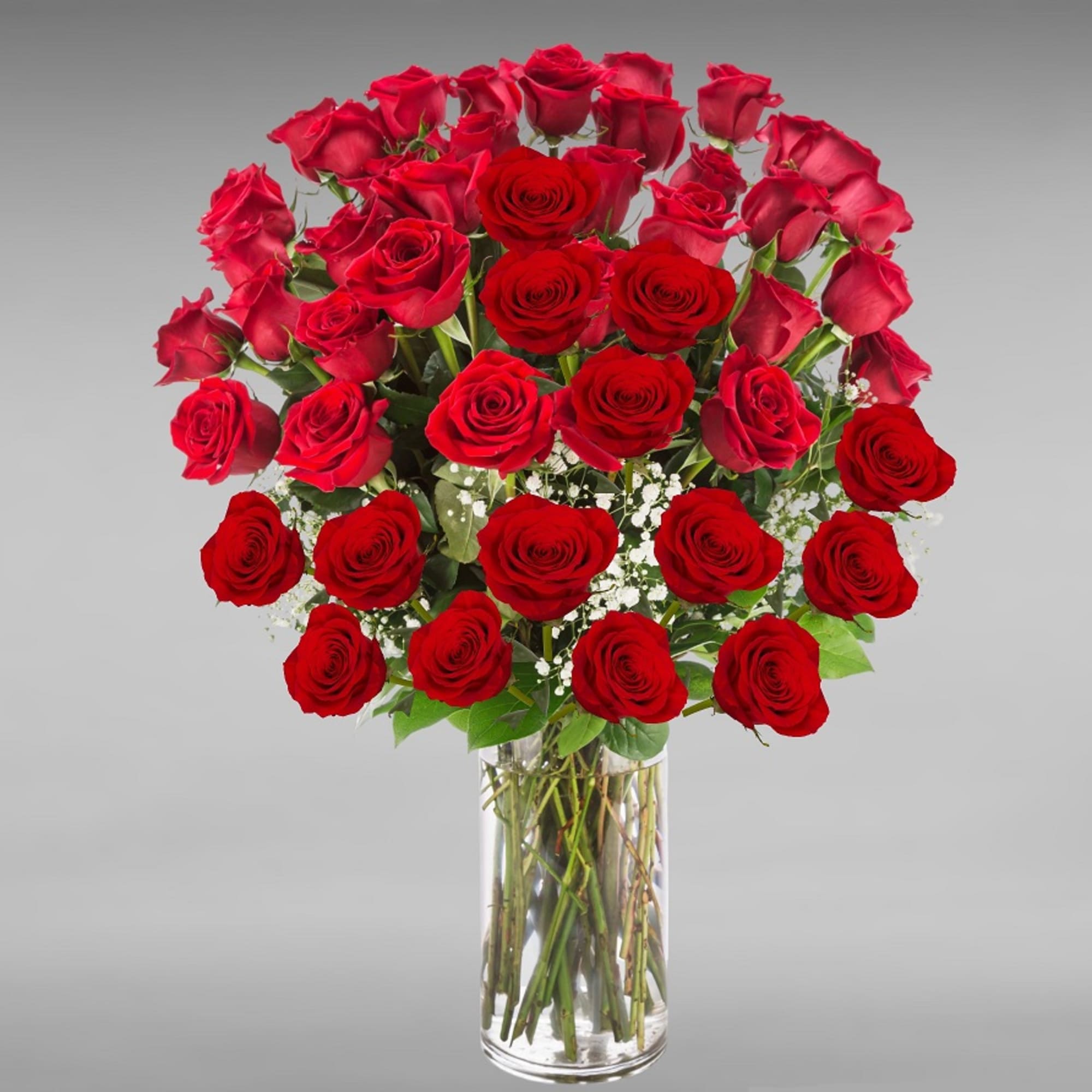 Go big with your love. Send the most extravagant red rose arrangement.