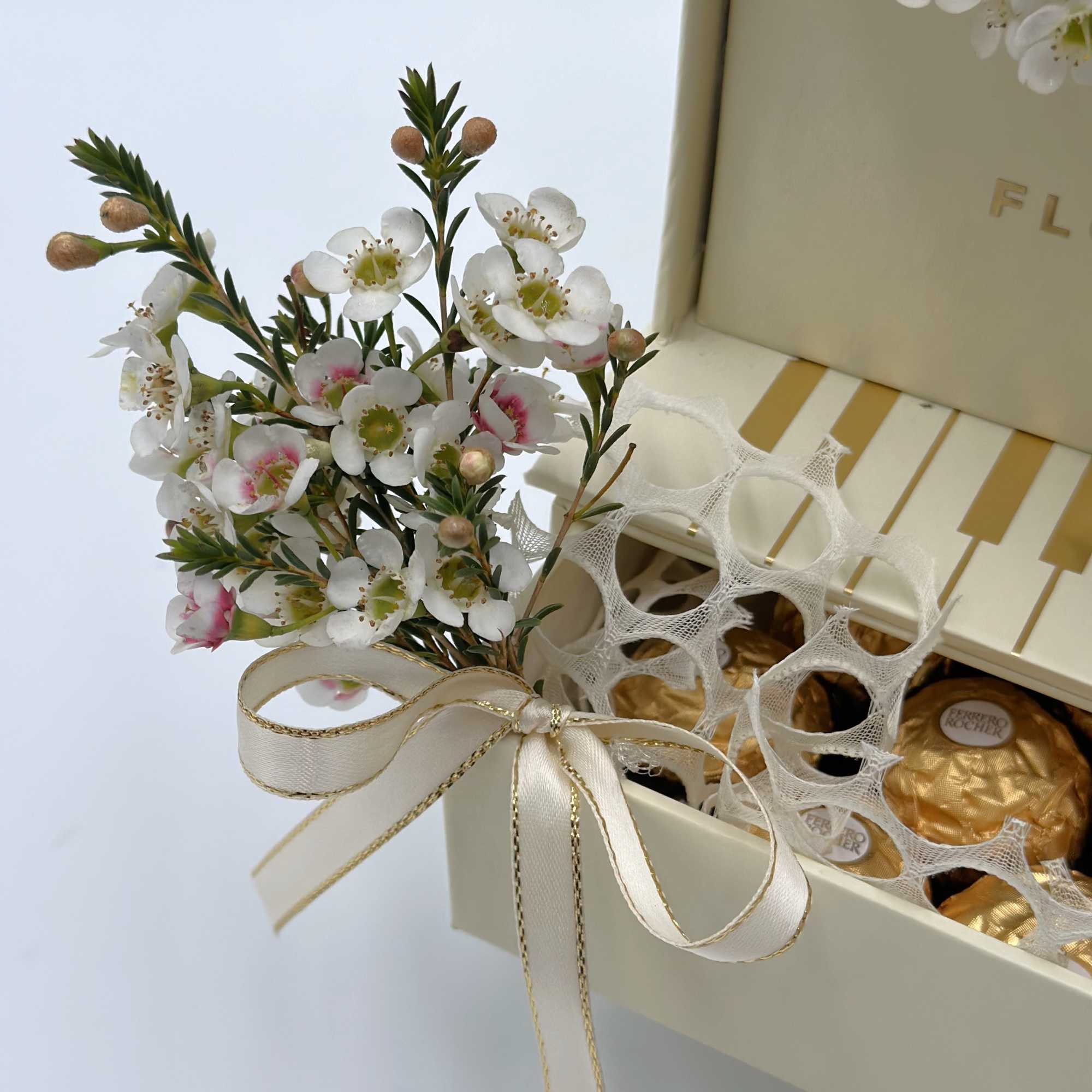Ranunculus and Rose delicate combination for Spring! This piano box arrangement comes