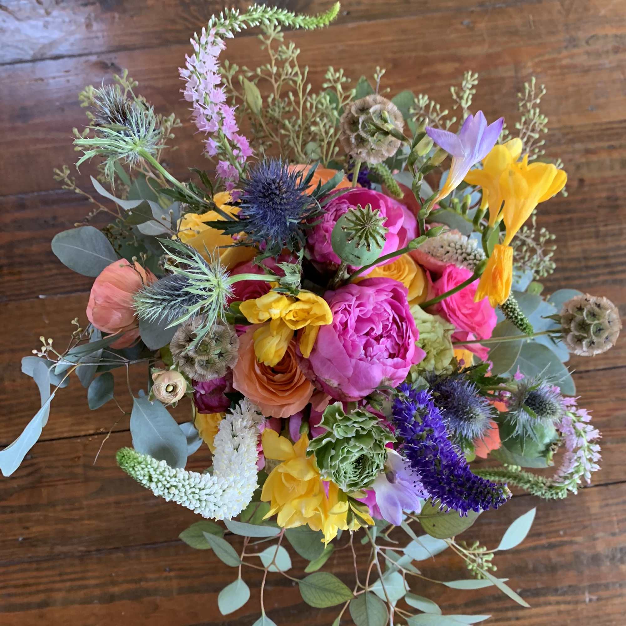 This fun summer bouquet is bound to make anyone smile. The colorful