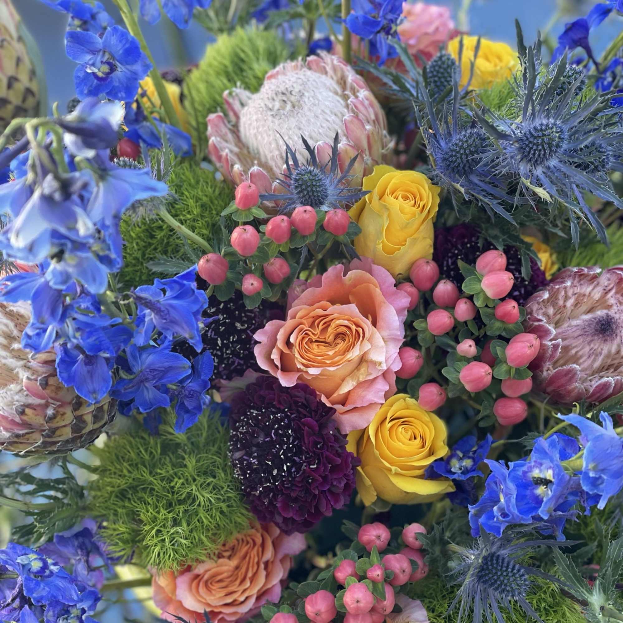 This bustling and bold arrangement is as unique as it is colorful.