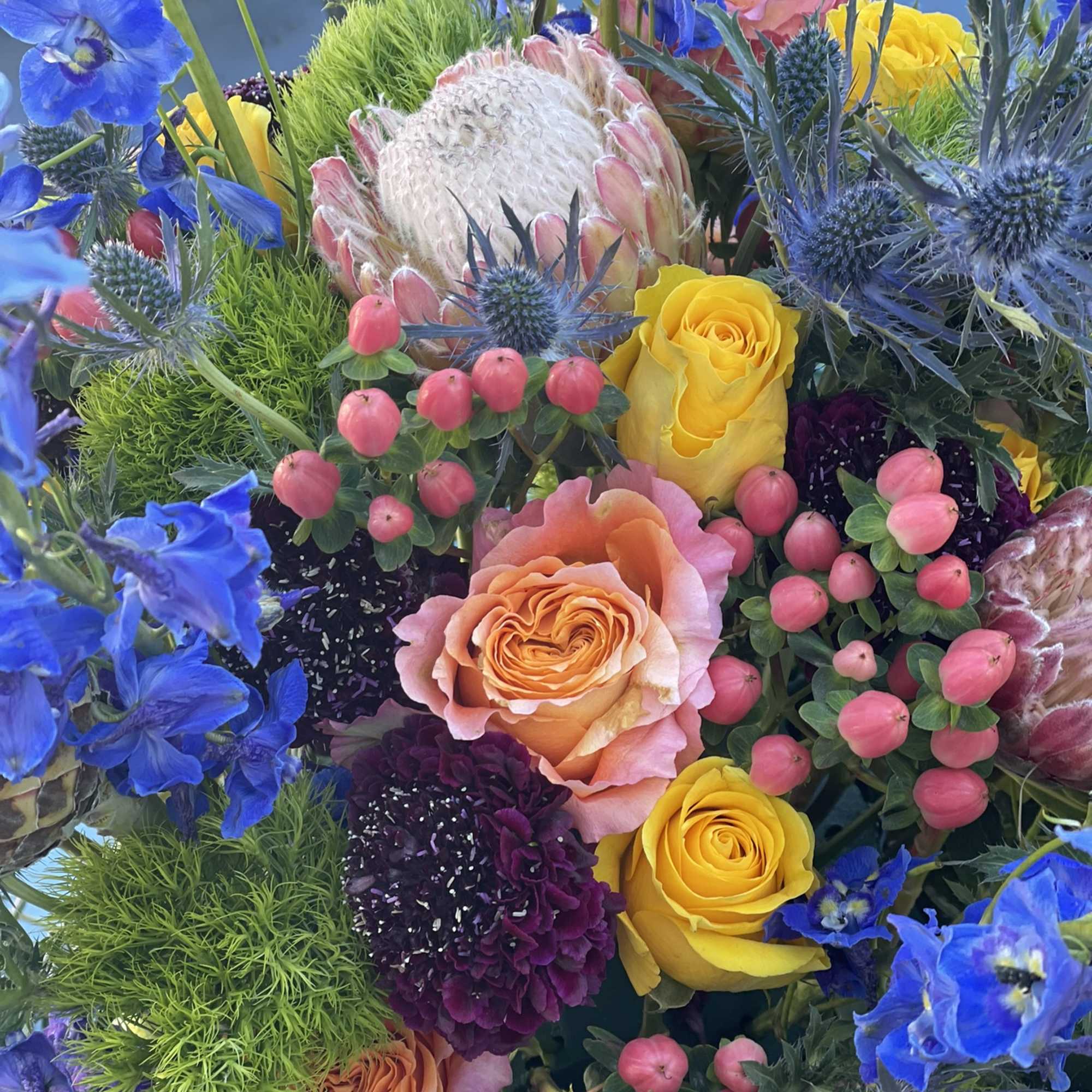 This bustling and bold arrangement is as unique as it is colorful.