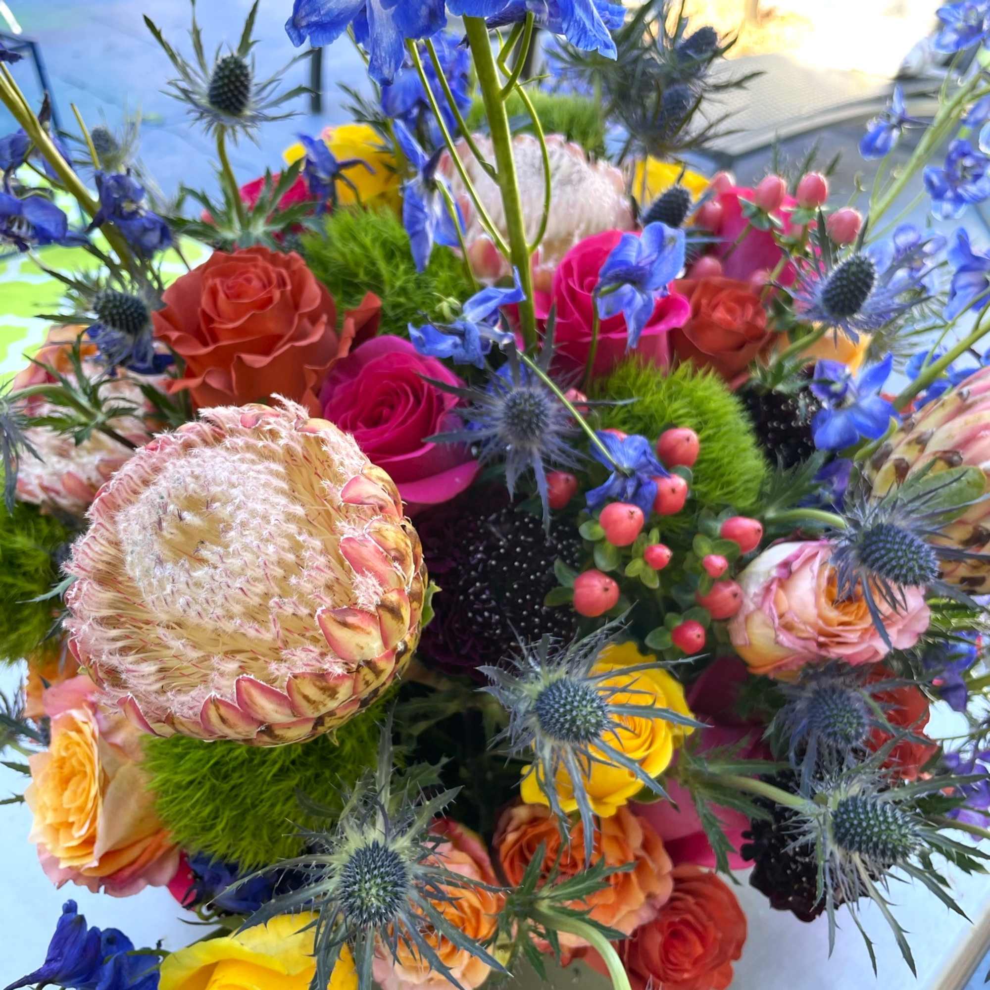 This bustling and bold arrangement is as unique as it is colorful.