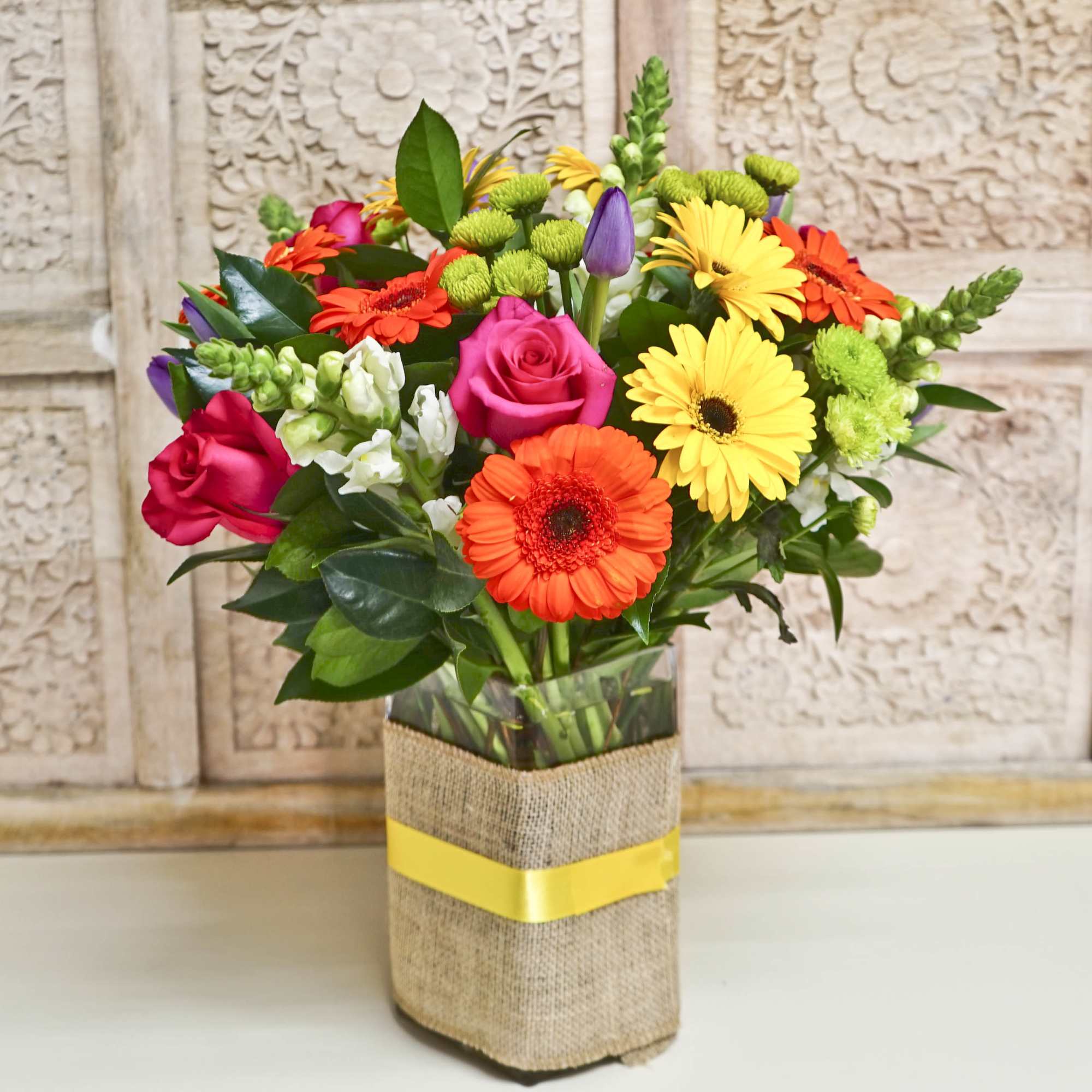 Tall Square w/ Gerber, Roses, Snapdragons. Approx. size: Medium arrangement 16&quot; tall